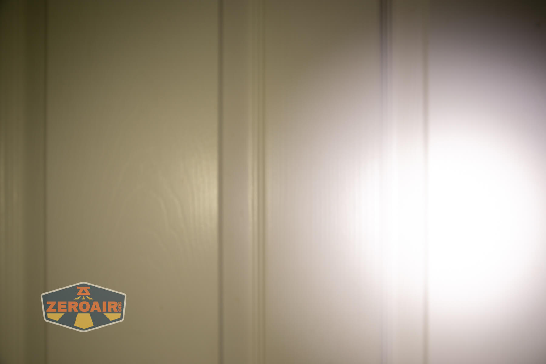 Imalent GR36 flashlight beamshots on door (at 1') compared to nichia 219b 4500K