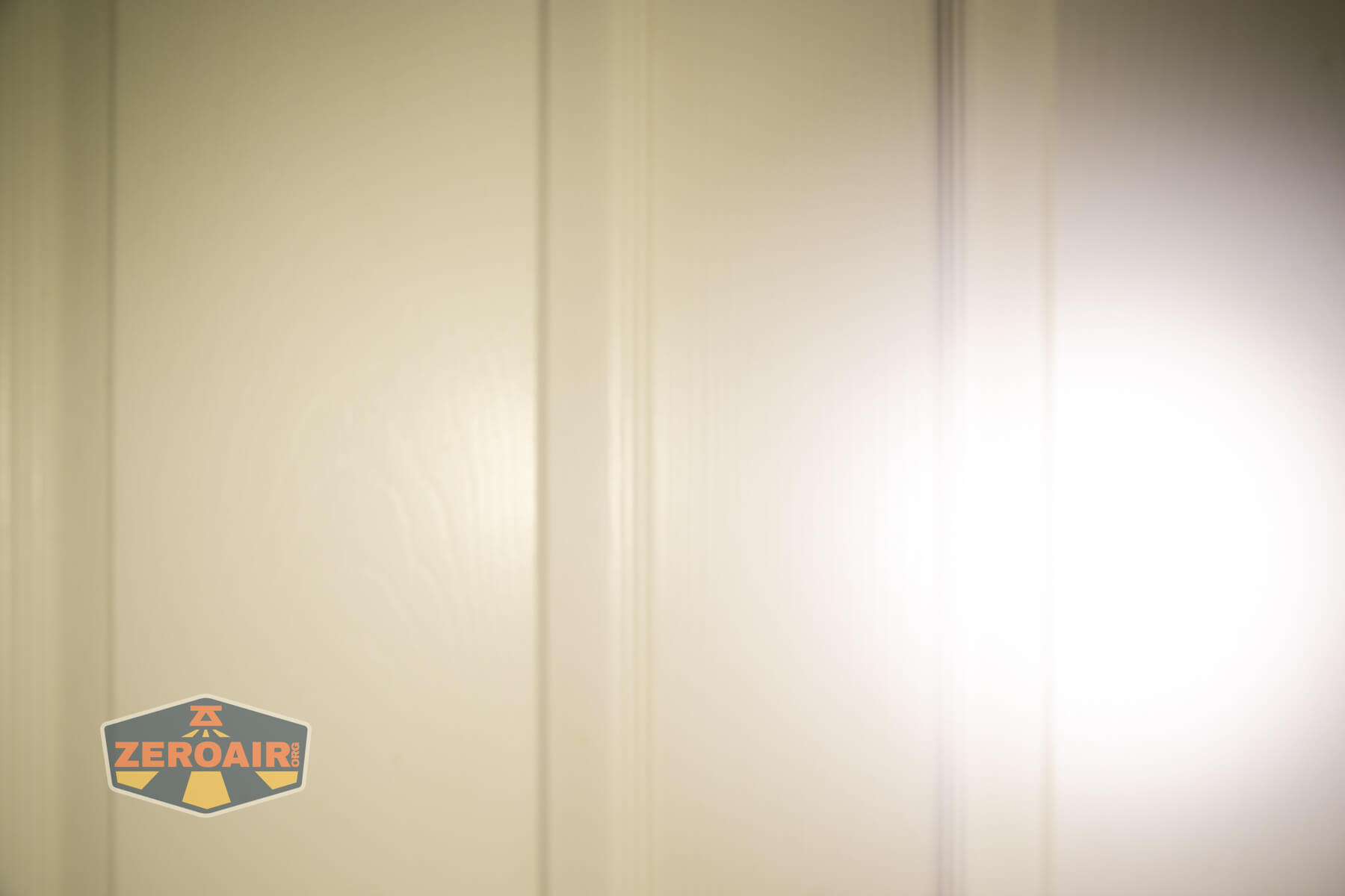 Imalent GR36 flashlight beamshots on door (at 1') compared to nichia 219b 4500K