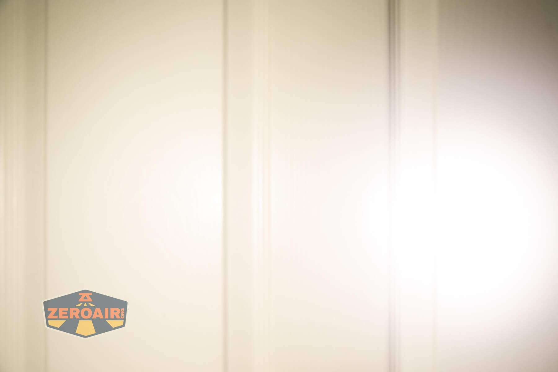 Imalent GR36 flashlight beamshots on door (at 1') compared to nichia 219b 4500K