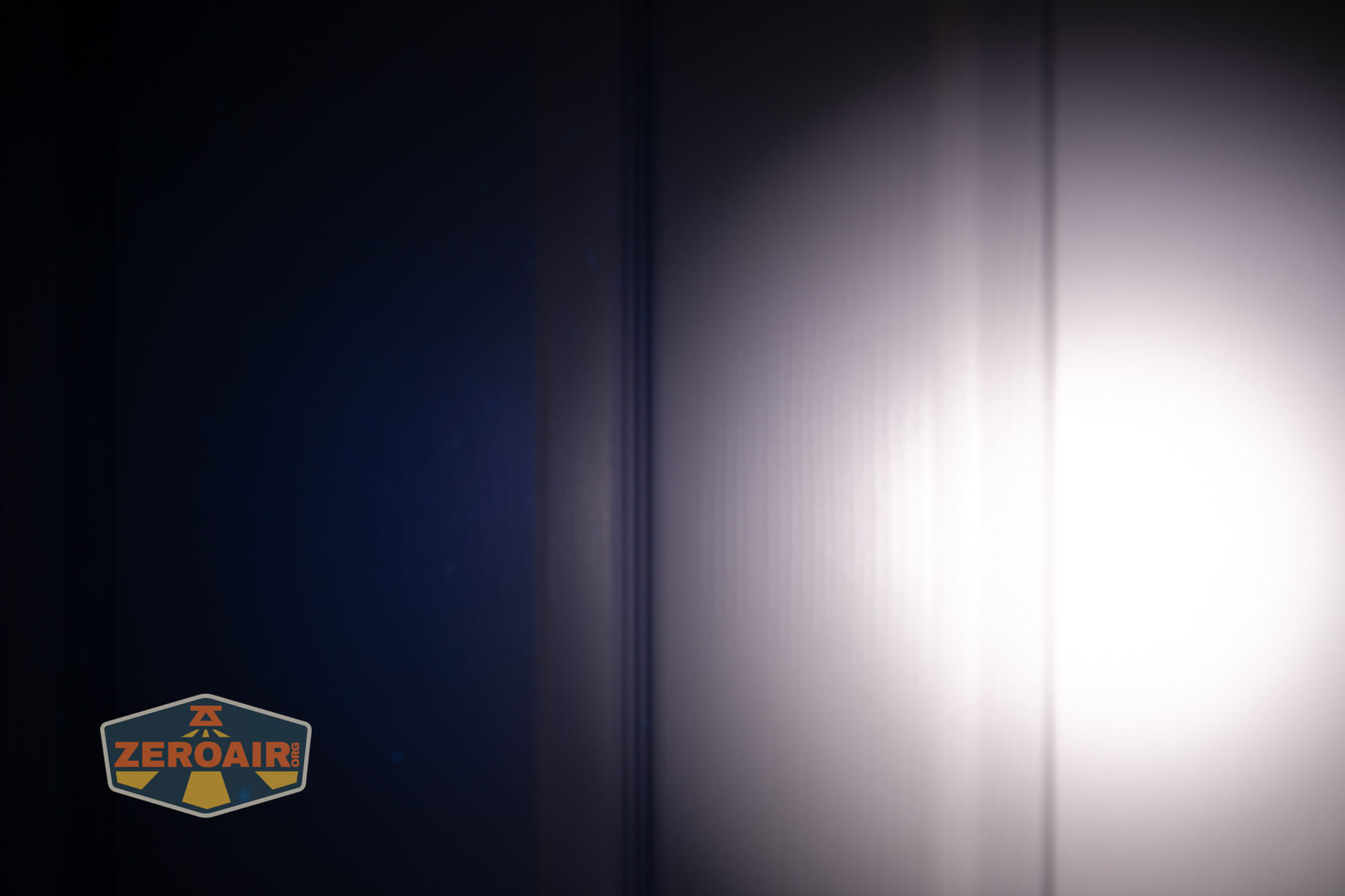 Imalent GR36 flashlight beamshots on door (at 1') compared to nichia 219b 4500K