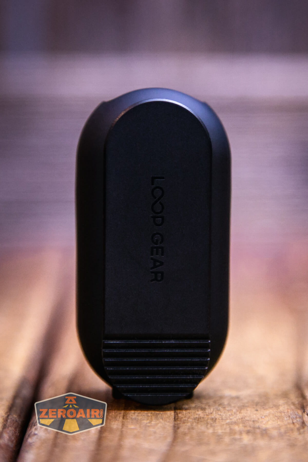 LoopGear LoopDot Pixel Display EDC flashlight standing side view in case