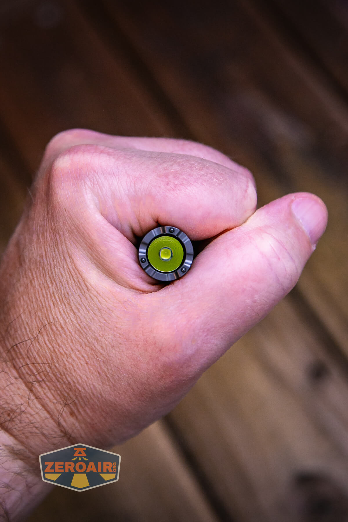 Nextorch TA22 20th anniversary penlight in hand