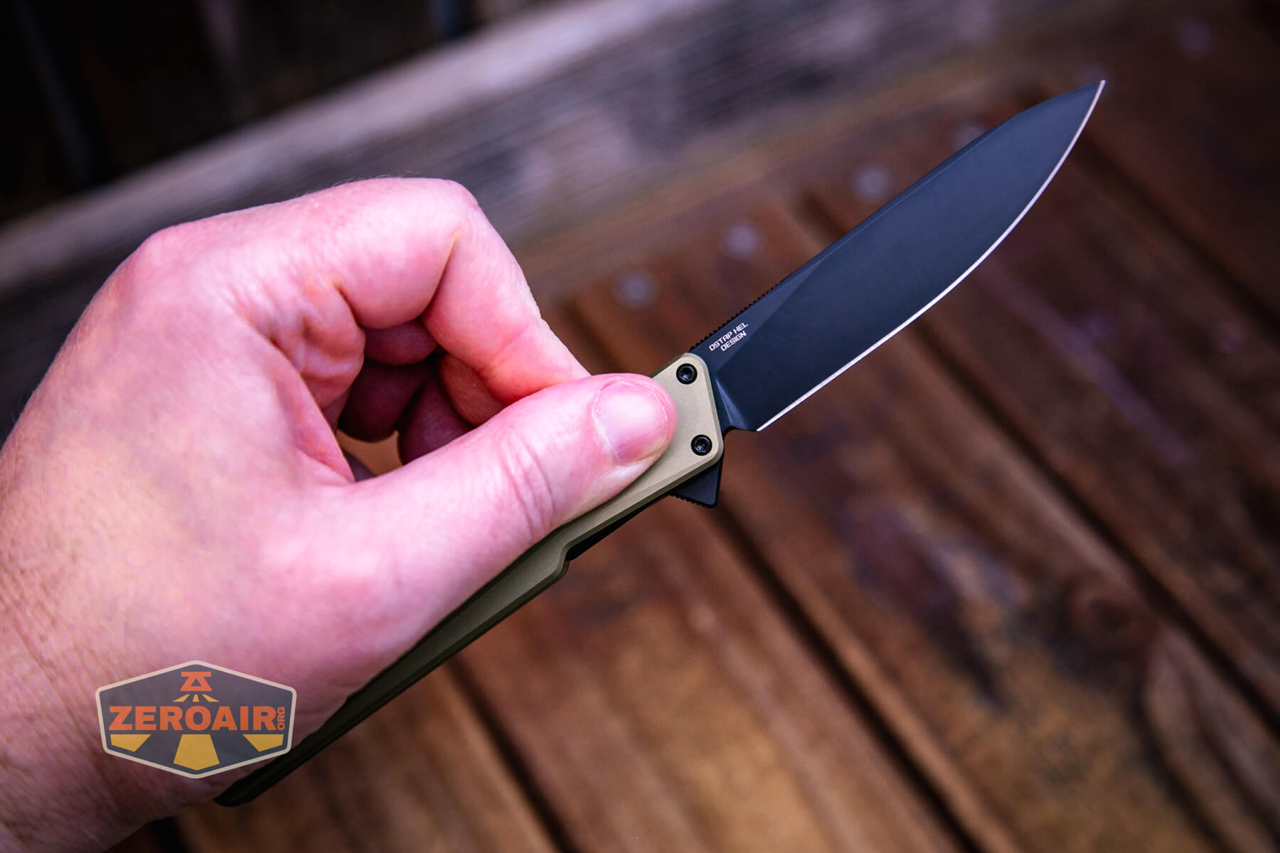 Olight Aion Gentleman's folding knife flipped open