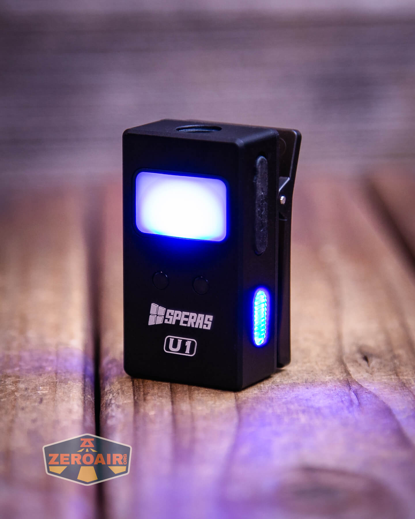 Speras U1 multi-function clip light blue lights on