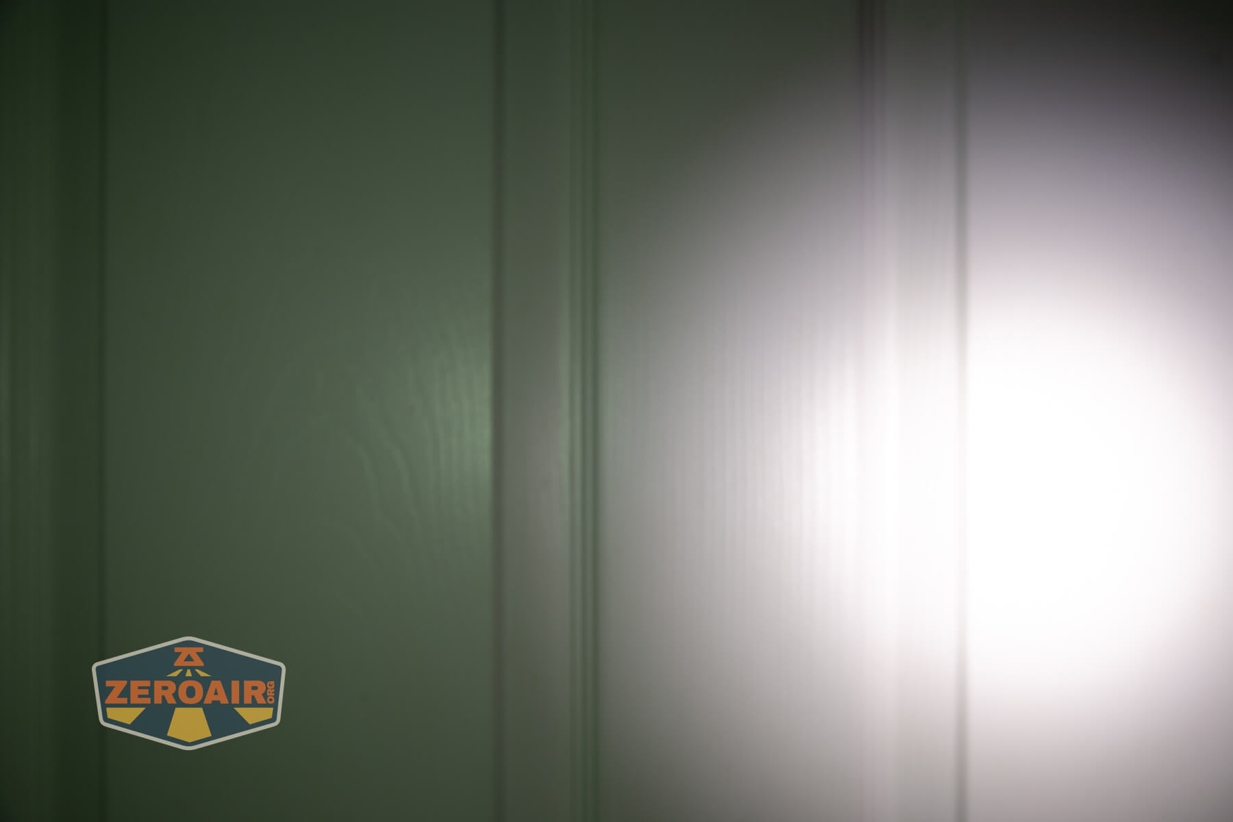 Speras U1 multi-function clip light beamshots on door compared to nichia 219b