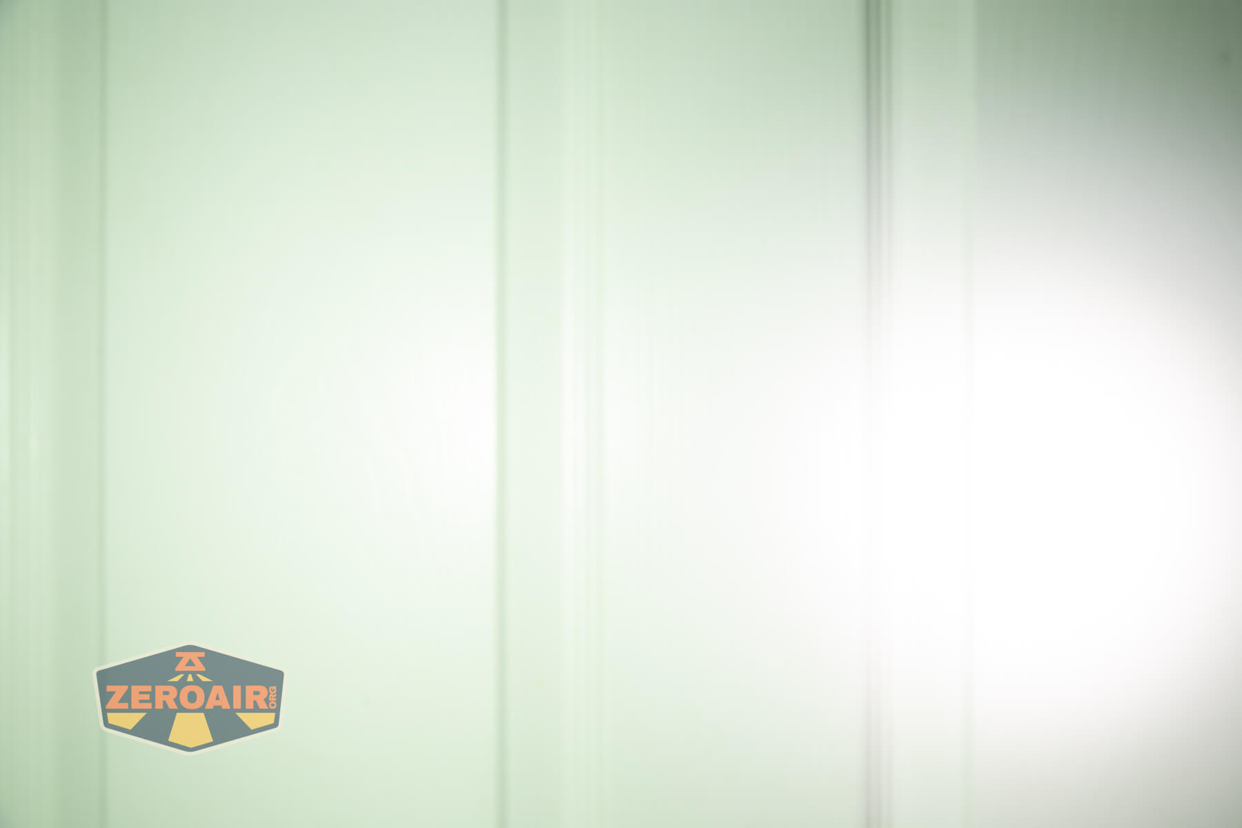 Speras U1 multi-function clip light beamshots on door compared to nichia 219b