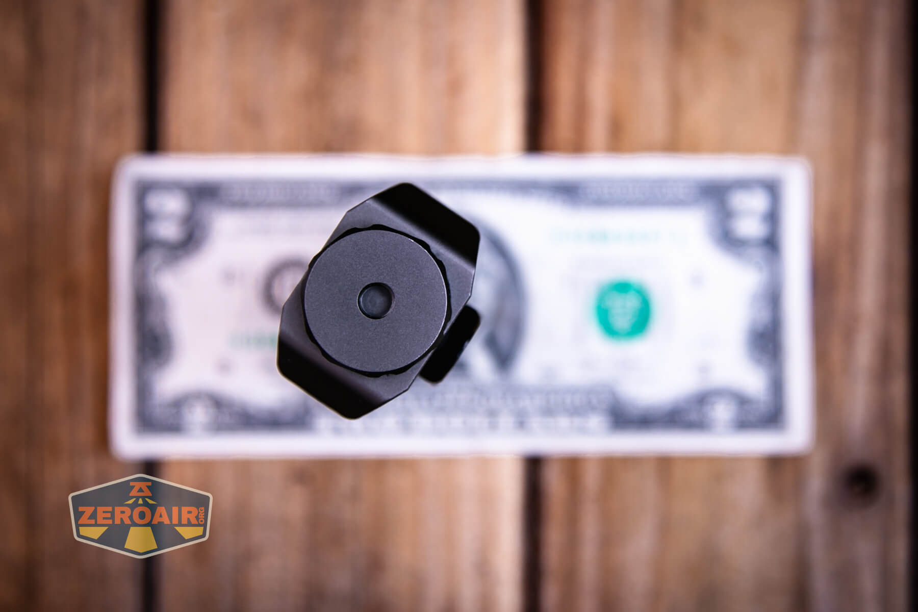 Wurkkos HD02 four beams flashlight on a two dollar bill