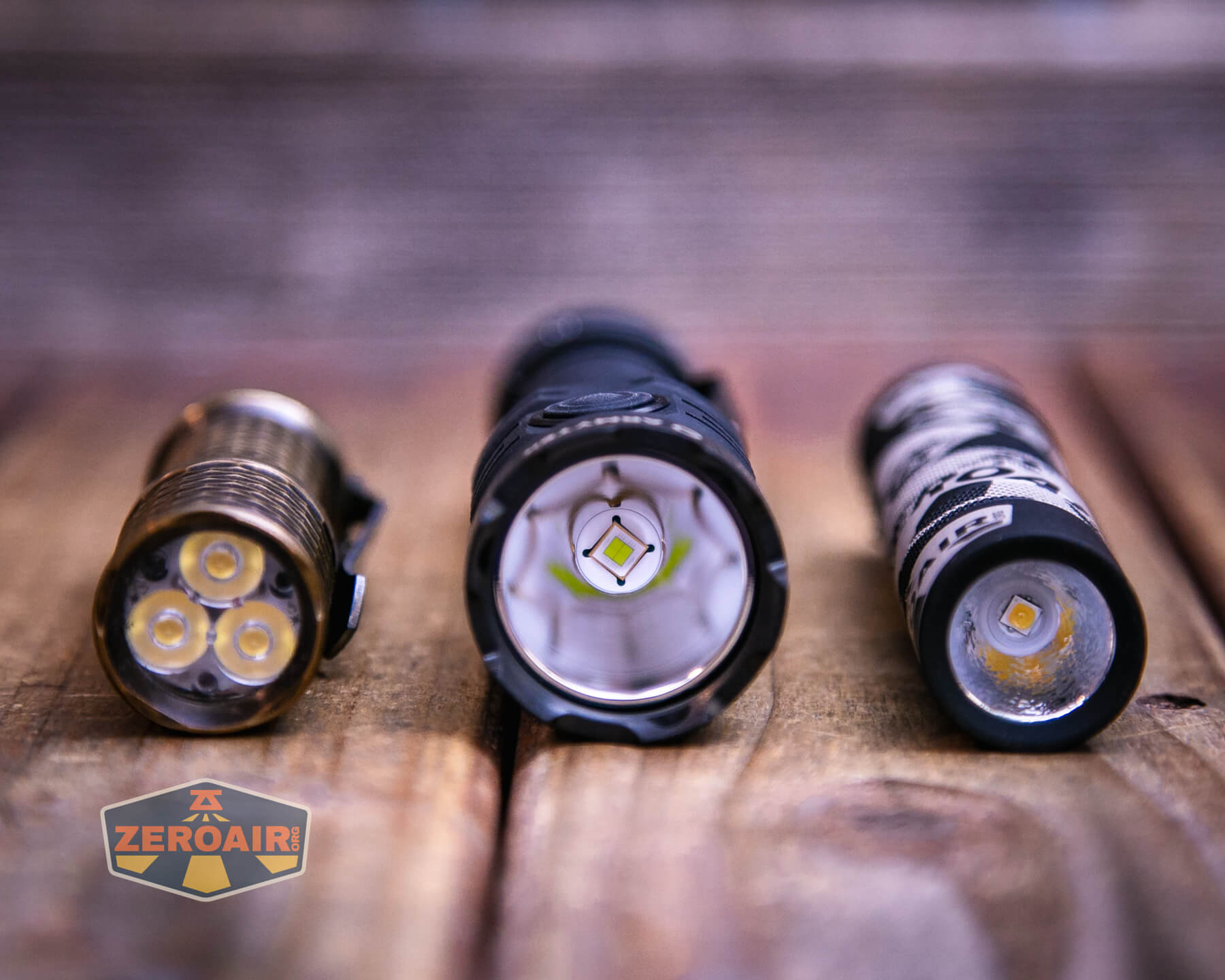 Armytek Dobermann Pro Max tactical flashlight with two standard sized flashlights