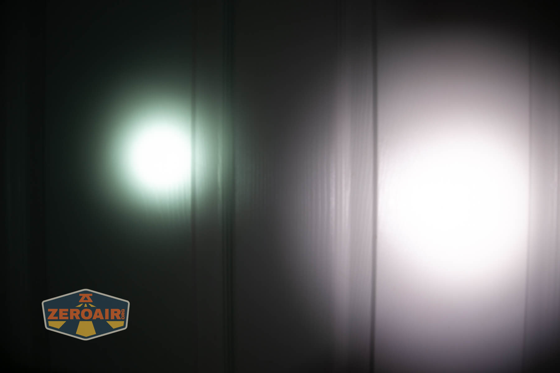 Armytek Dobermann Pro Max tactical flashlight beamshots on door (at 1') compared to nichia 219b 4500K