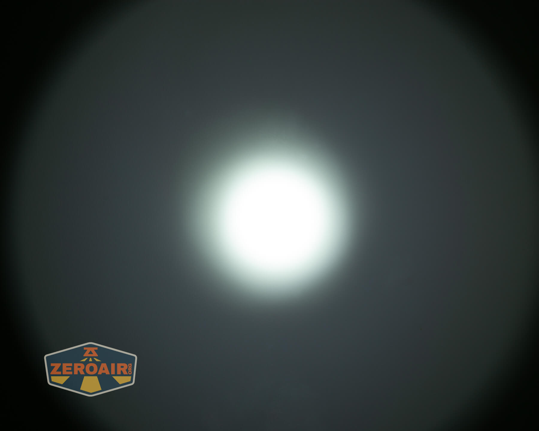 Armytek Predator Pro Max flashlight beamshots on ceiling