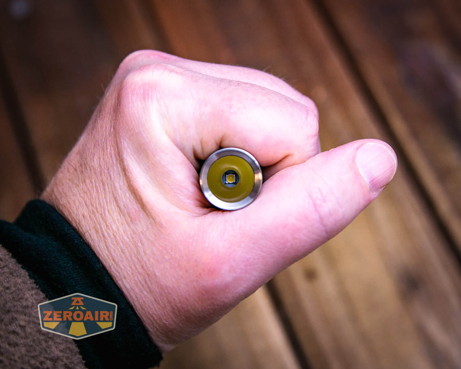 CWF Mini Arc flashlight in hand