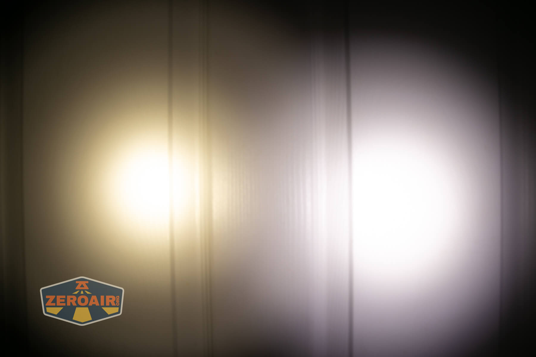 CWF Mini Arc flashlight beamshots on door (at 1') compared to nichia 219b 4500K