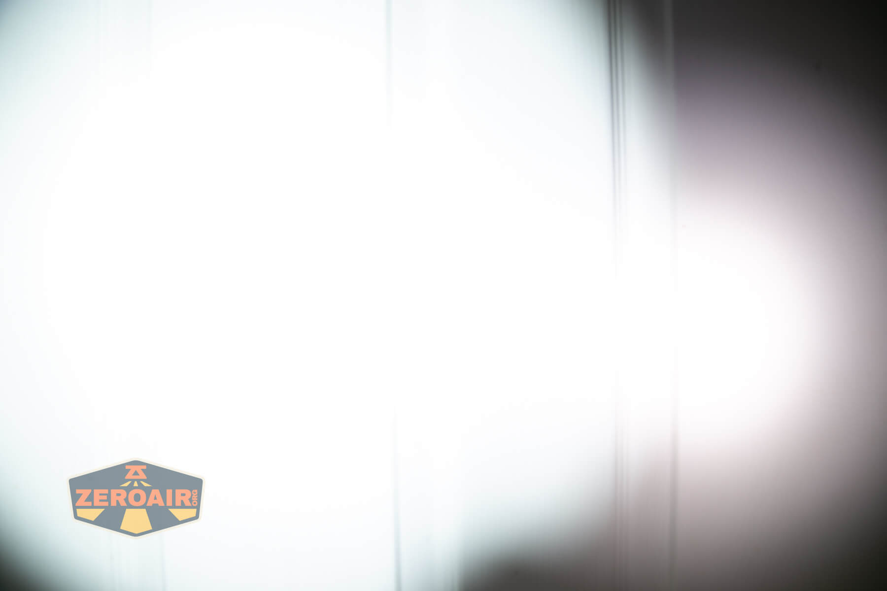 Nextorch TA30D MAX One-Step-Strobe flashlight beamshots on door (at 1') compared to nichia 219b 4500K