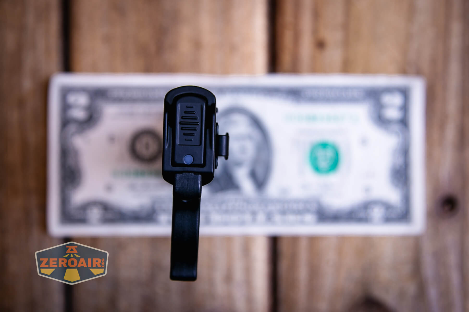 Nextorch TA70 Ultra-Slim Tactical EDC flashlight on a two dollar bill