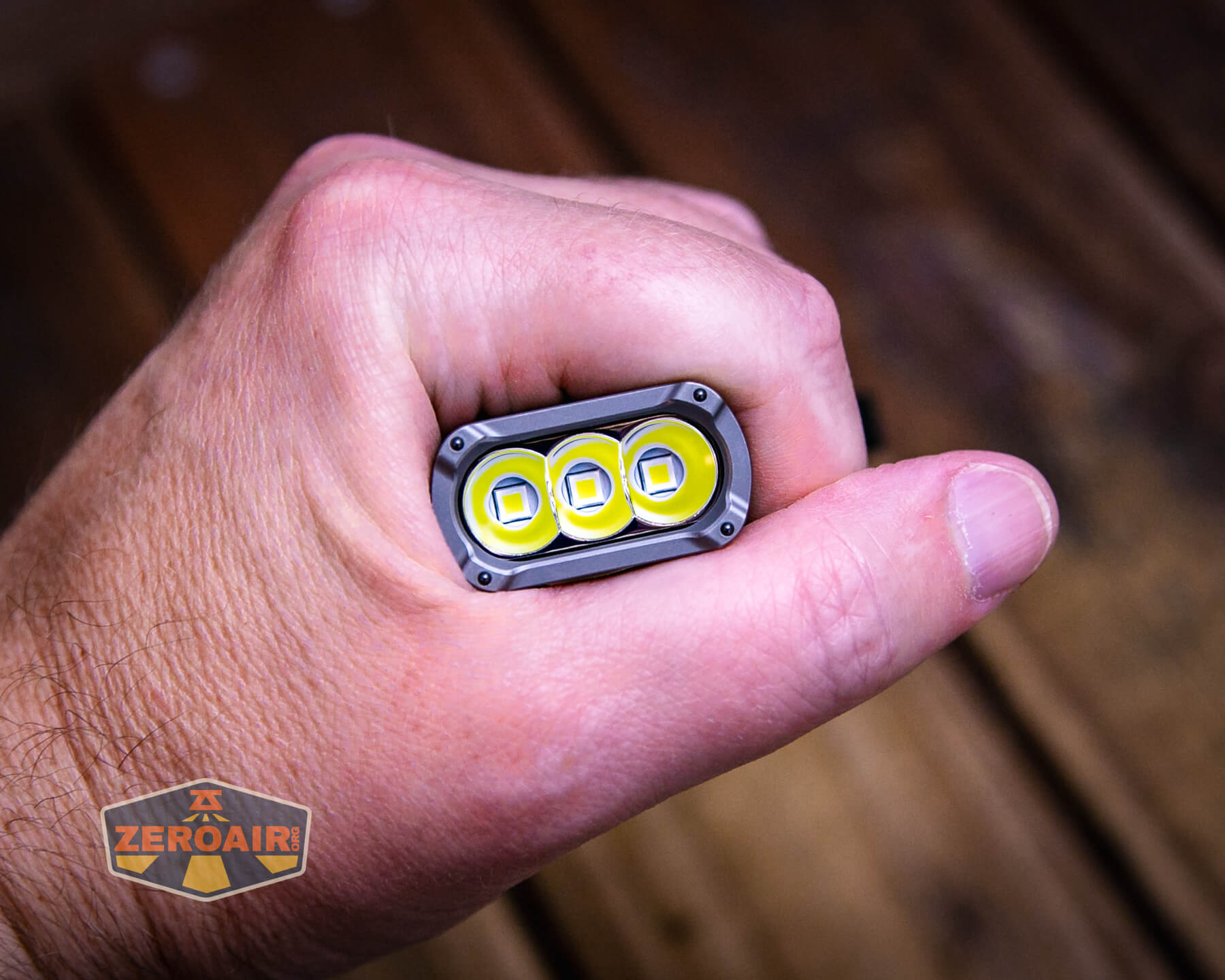 Nextorch TA70 Ultra-Slim Tactical EDC flashlight in hand