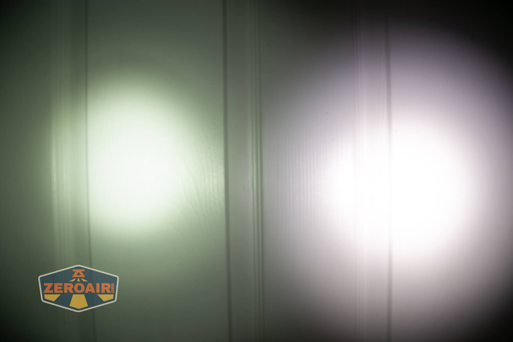 Nextorch TA70 Ultra-Slim Tactical EDC flashlight beamshots on door (at 1') compared to nichia 219b 4500K