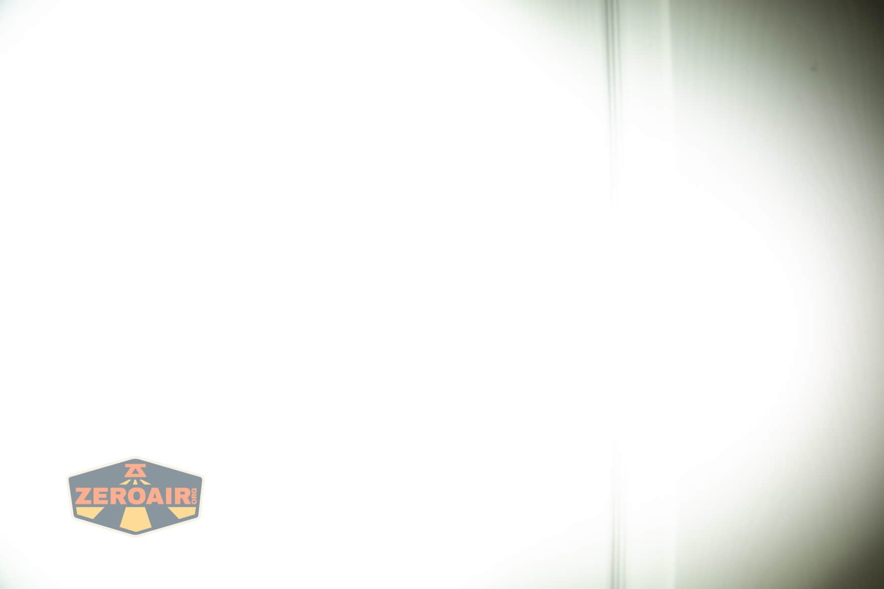 Nextorch TA70 Ultra-Slim Tactical EDC flashlight beamshots on door (at 1') compared to nichia 219b 4500K