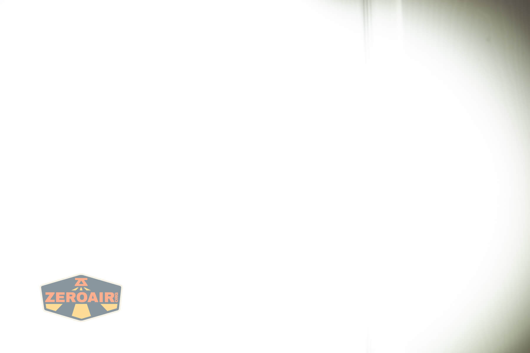 Nextorch TA70 Ultra-Slim Tactical EDC flashlight beamshots on door (at 1') compared to nichia 219b 4500K