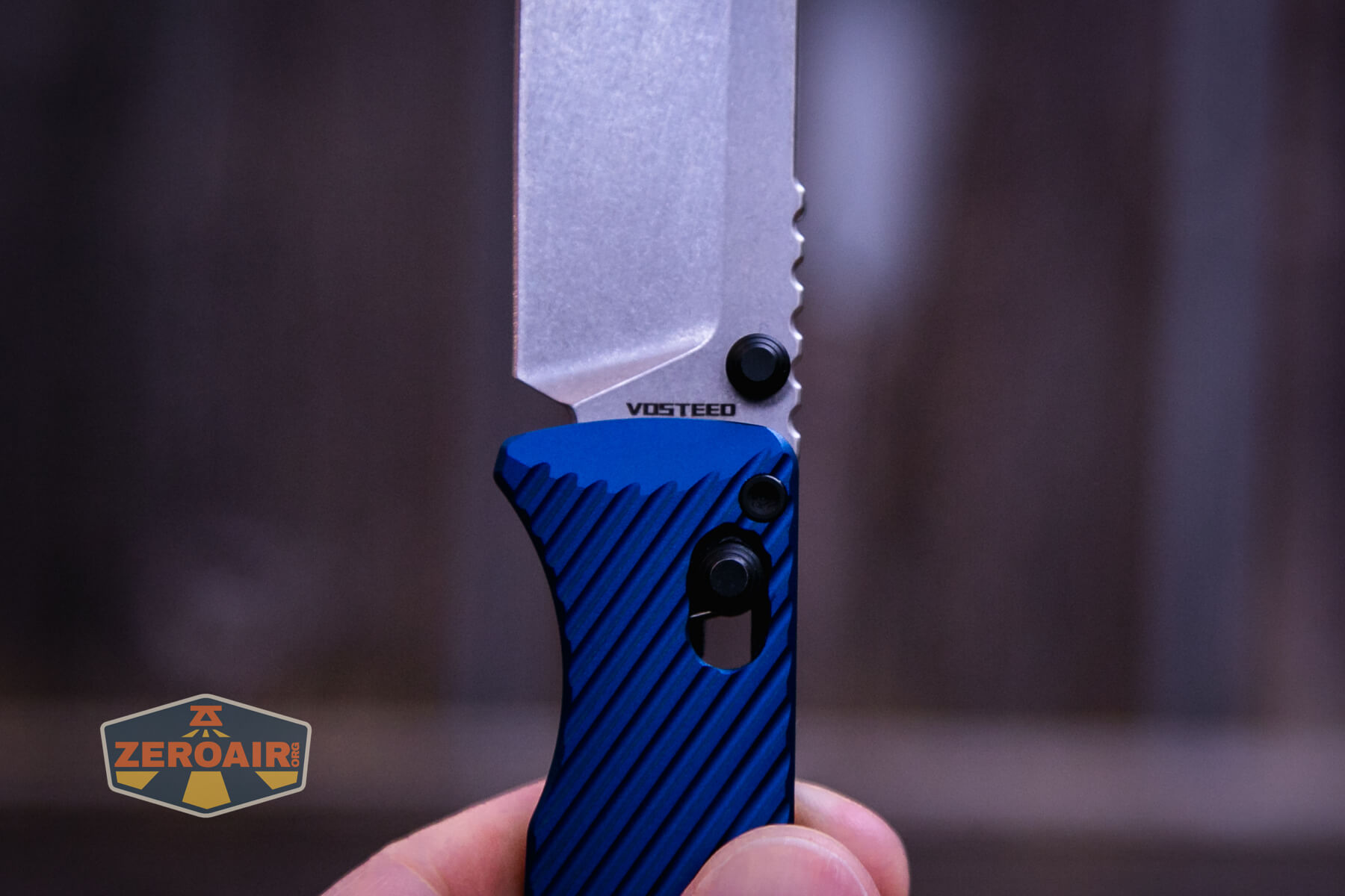 Vosteed Vombat Crossbar lock knife branding on blade
