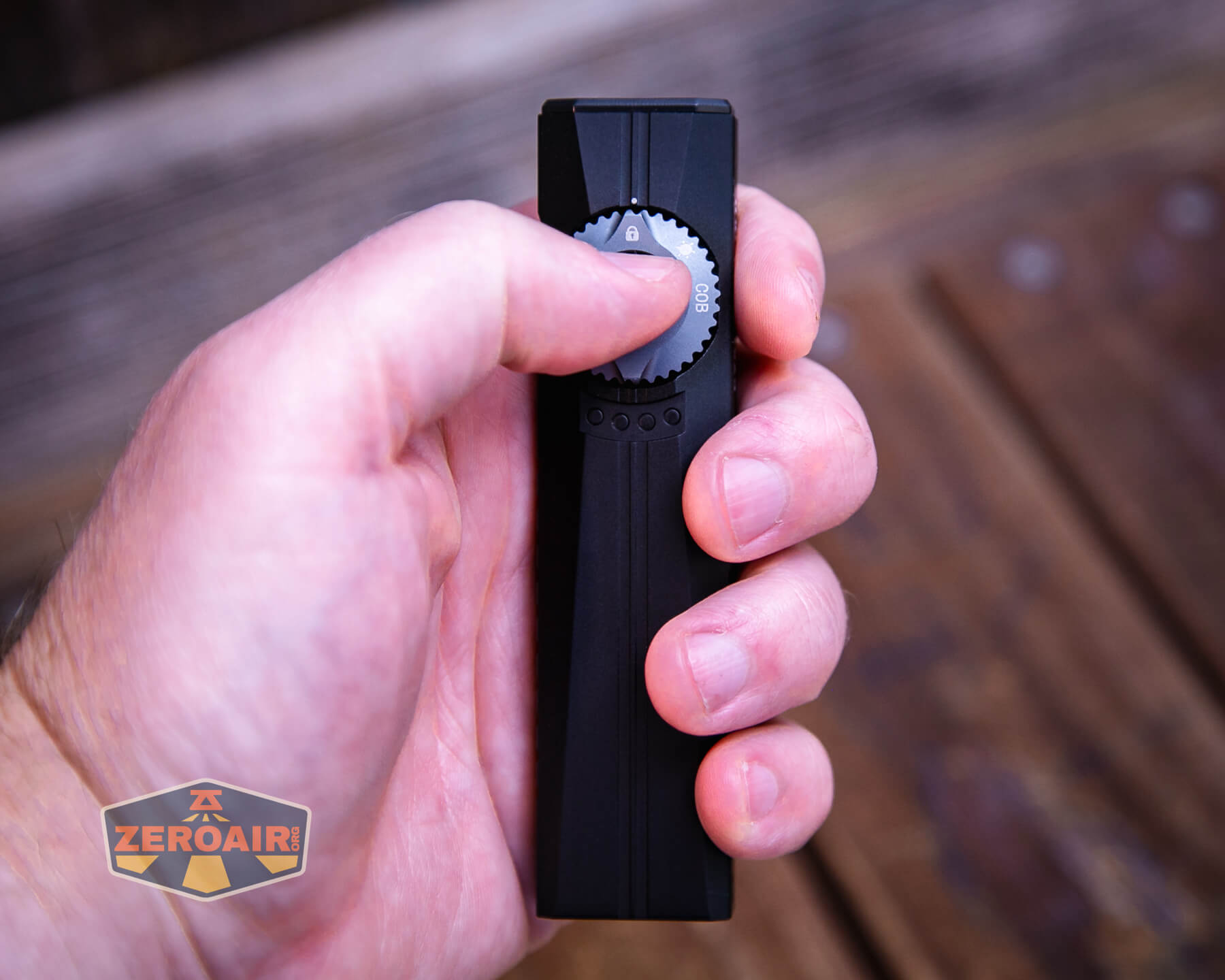 Cyansky Ark II EDC flat flashlight in hand