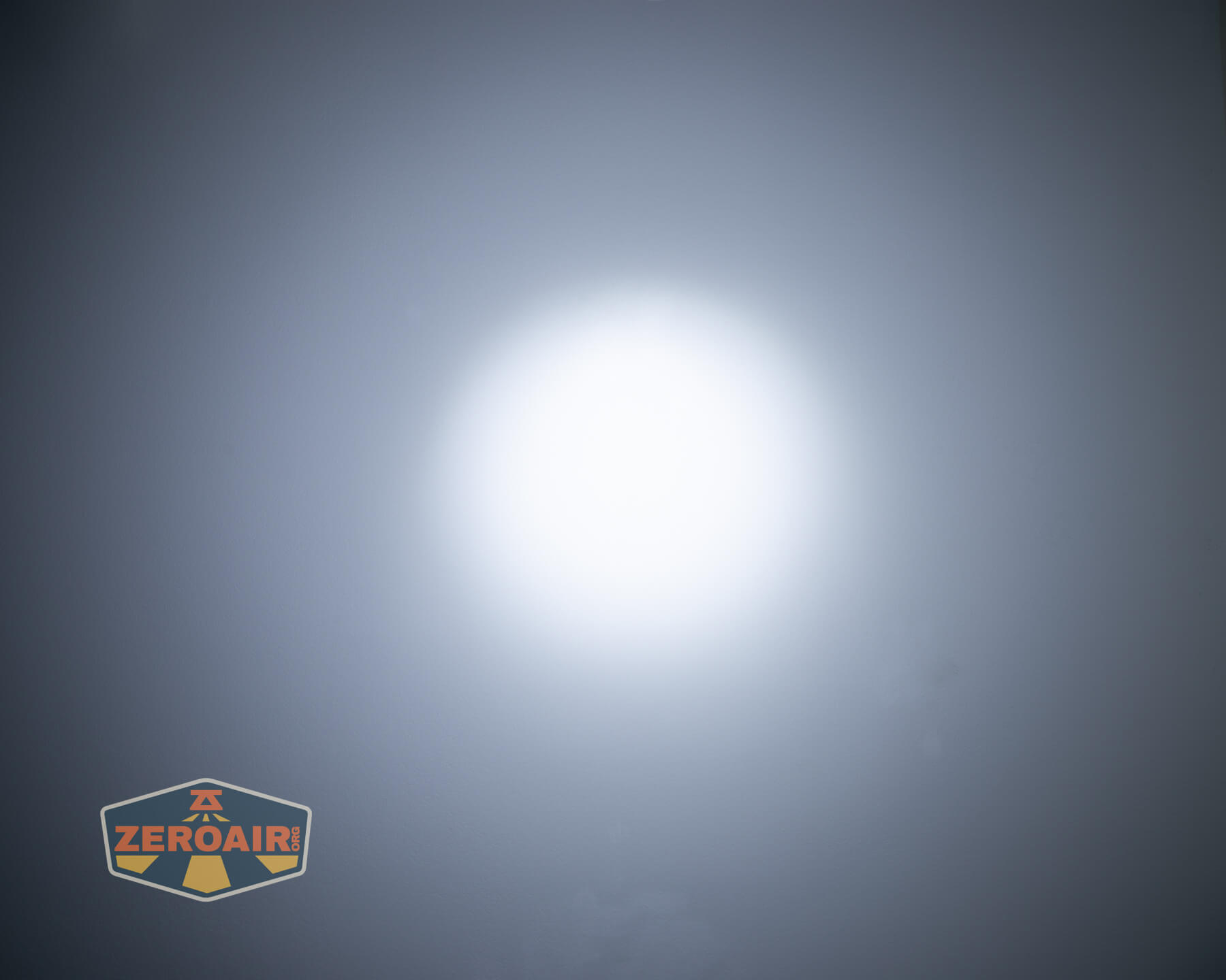 Cyansky Ark II EDC flat flashlight beamshots on ceiling