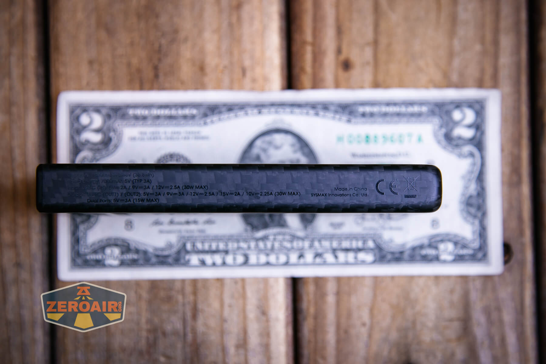 Nitecore Carbo 10000 Gen2 Powerbank on two dollar bill