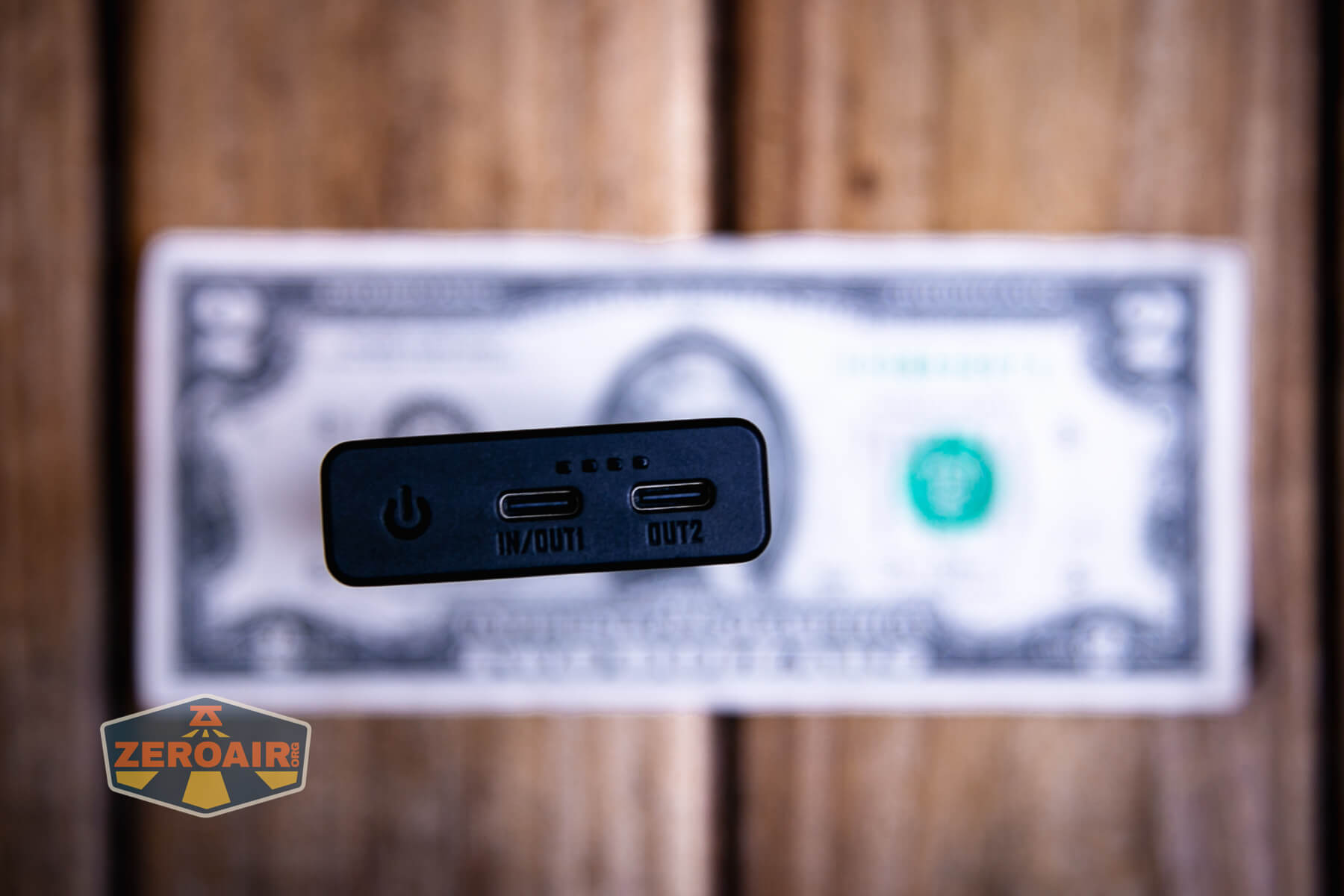 Nitecore Carbo 10000 Gen2 Powerbank on two dollar bill