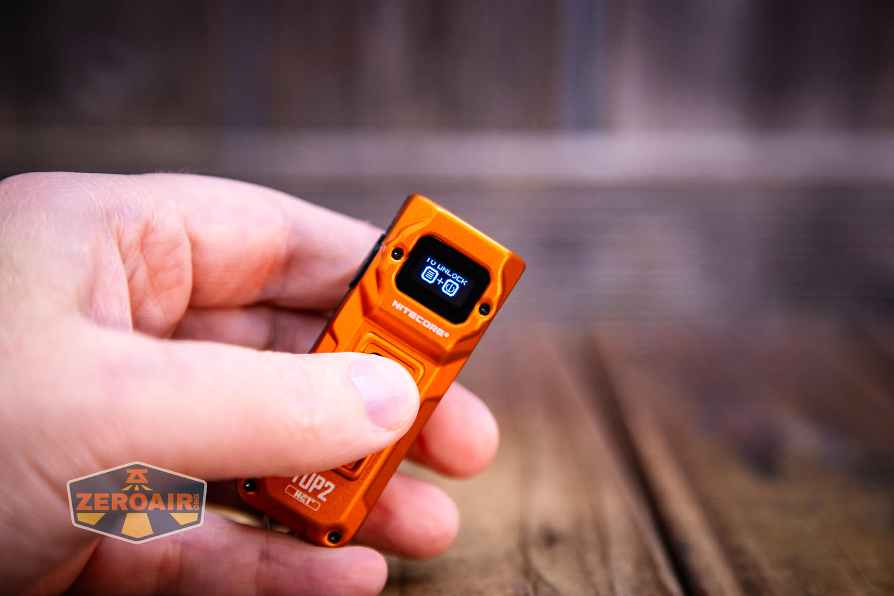 Nitecore TUP2 rechargeable keychain flashlight OLED display in use