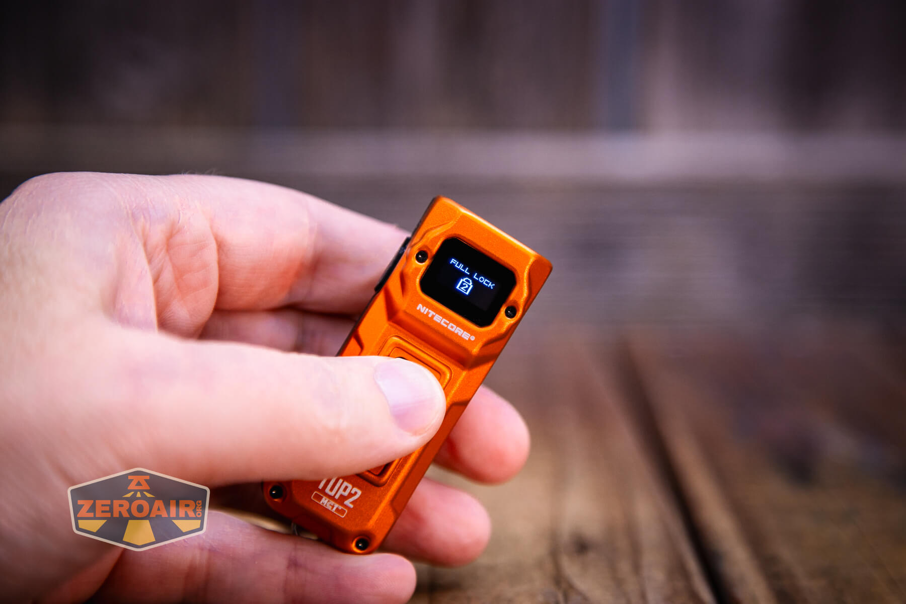 Nitecore TUP2 rechargeable keychain flashlight OLED display in use