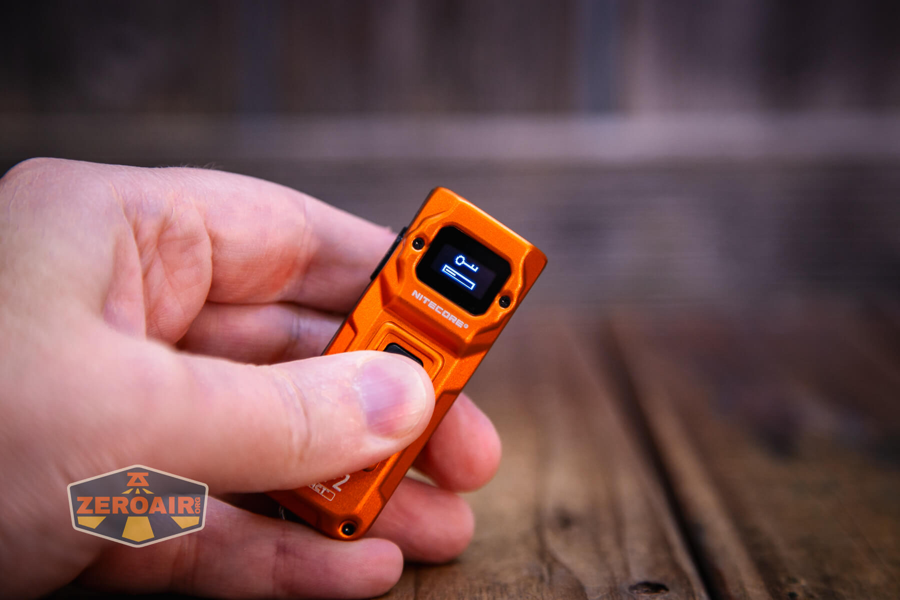 Nitecore TUP2 rechargeable keychain flashlight OLED display in use