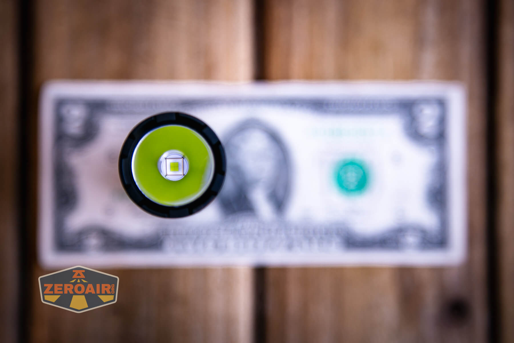 Thrunite Lynx flashlight on a two dollar bill