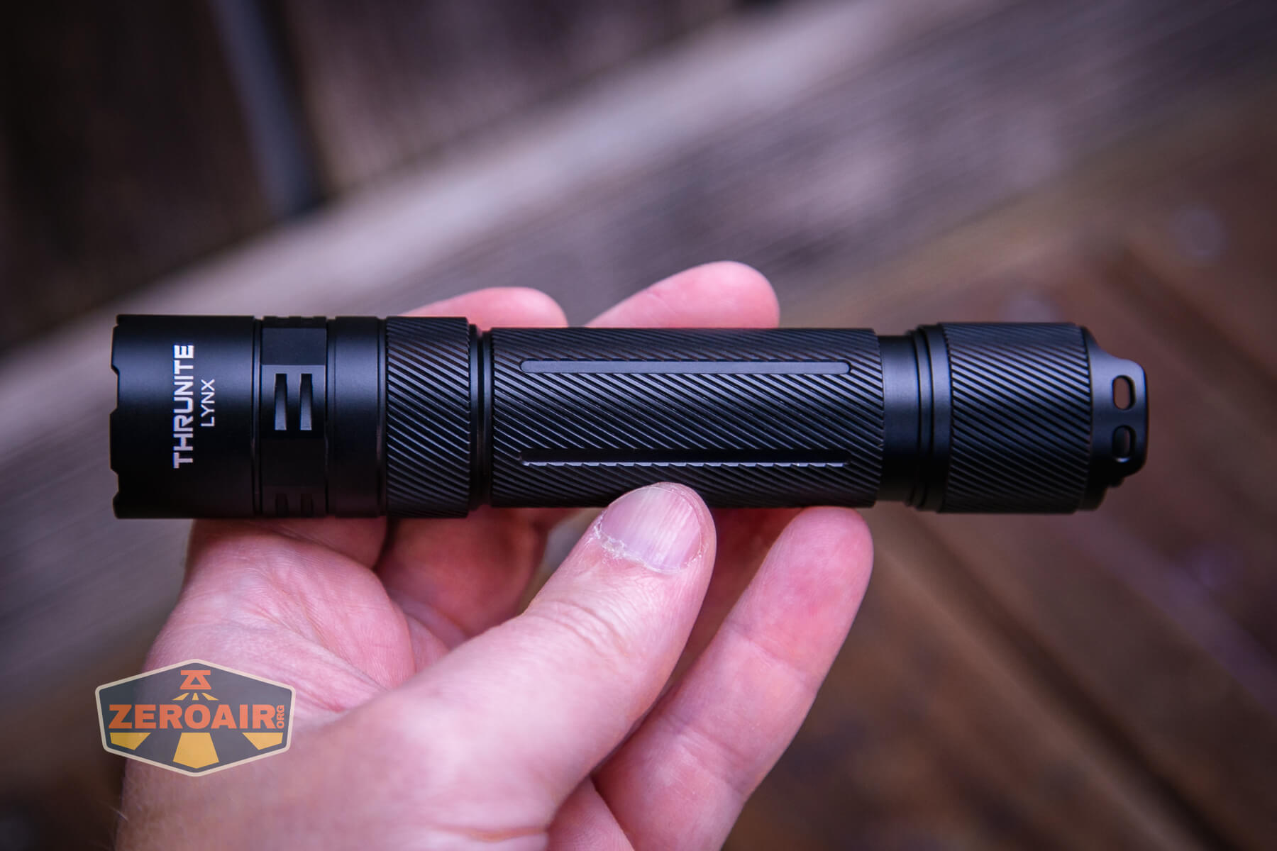 Thrunite Lynx flashlight in hand