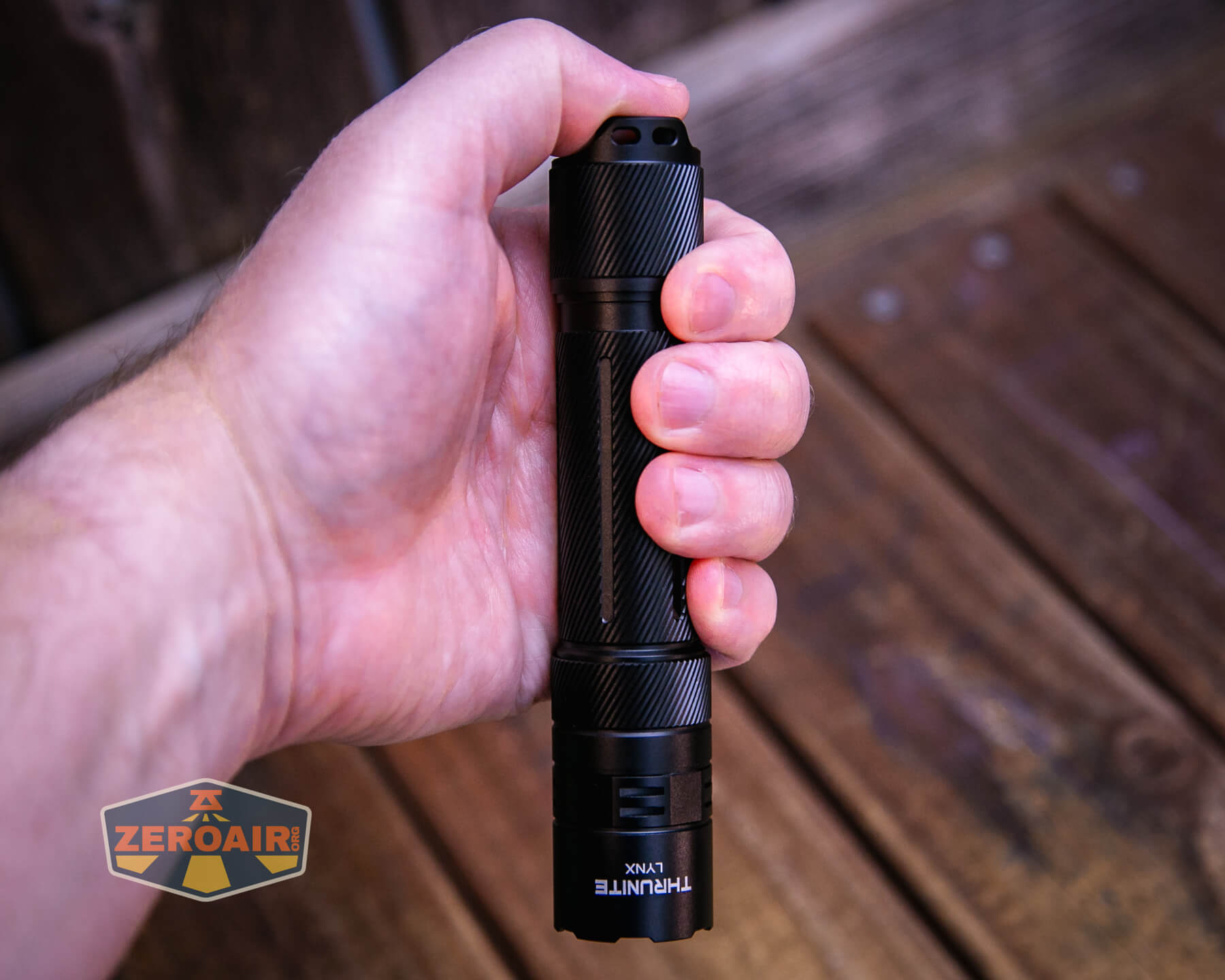 Thrunite Lynx flashlight in hand
