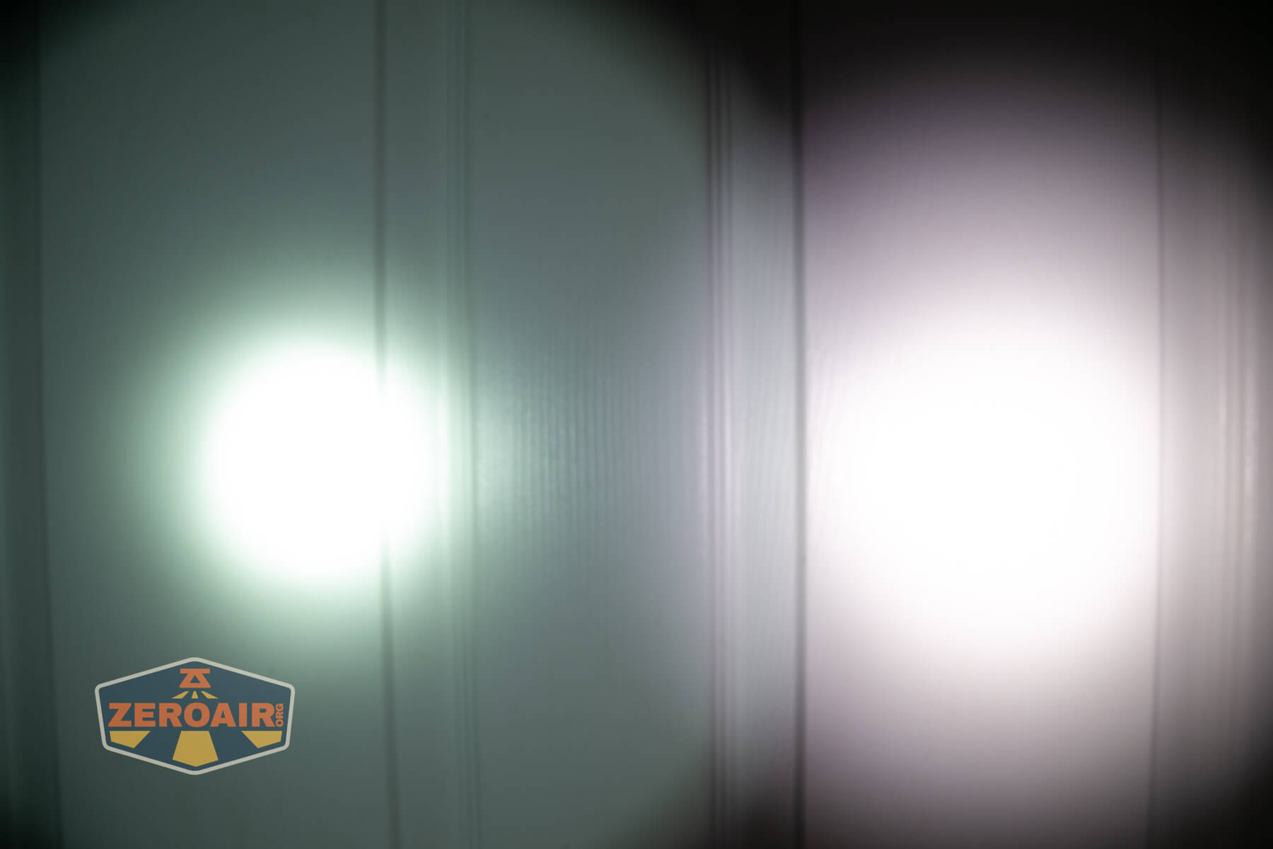 Thrunite Lynx flashlight beamshots on door (at 1') compared to nichia 219b 4500K