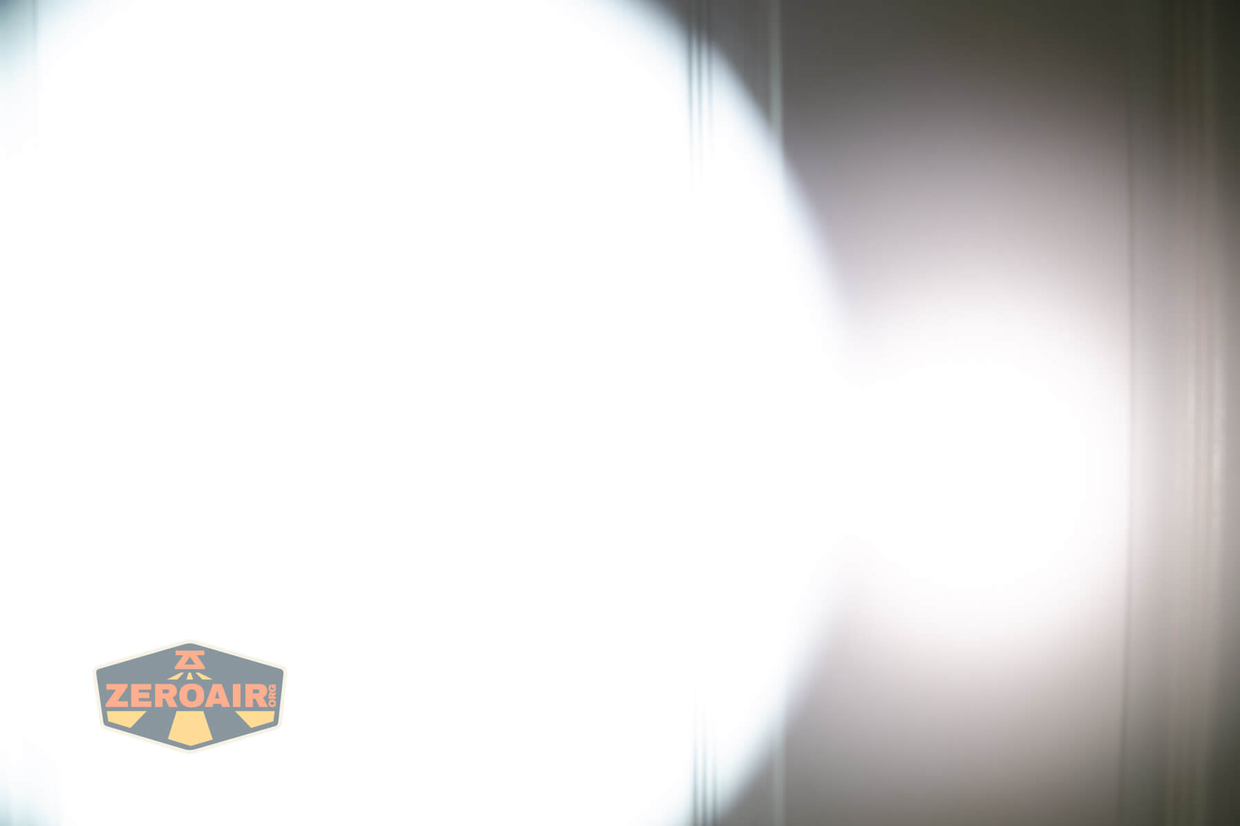 Thrunite Lynx flashlight beamshots on door (at 1') compared to nichia 219b 4500K