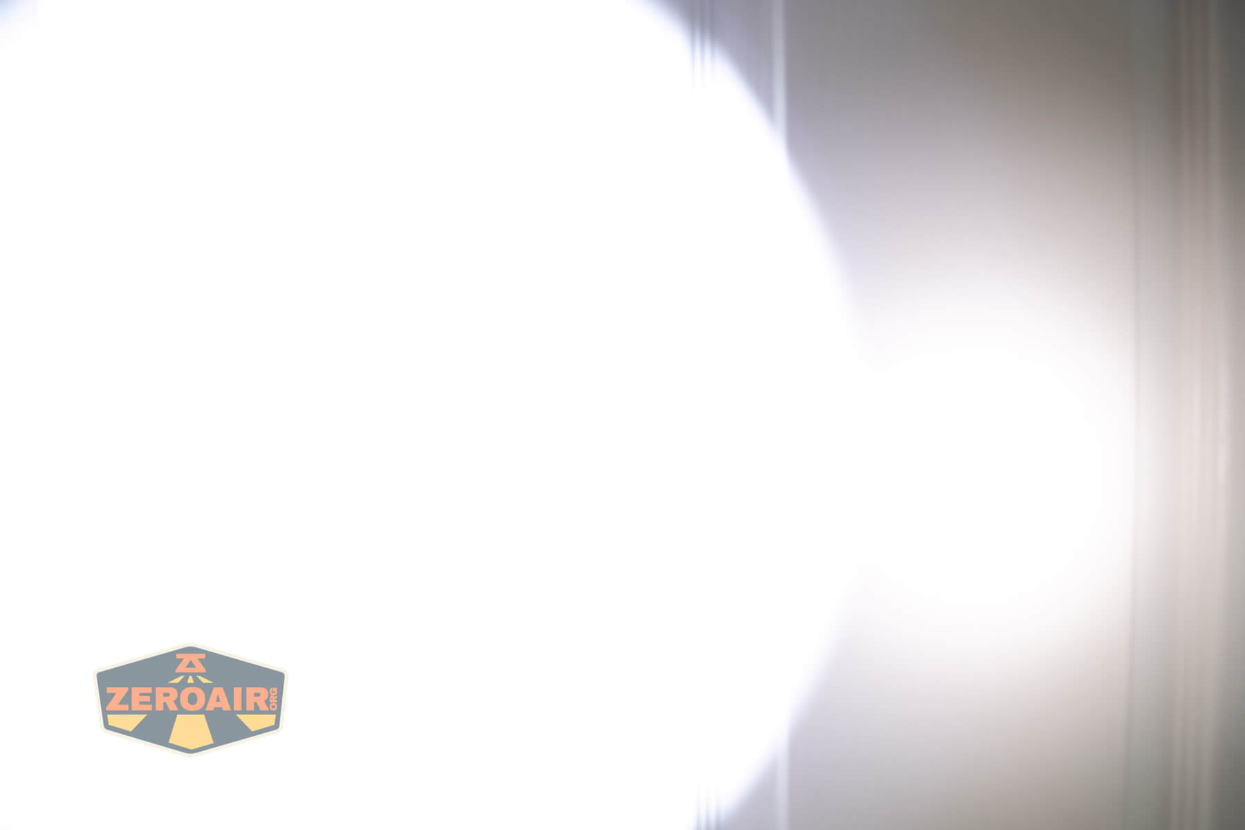 Thrunite Lynx flashlight beamshots on door (at 1') compared to nichia 219b 4500K