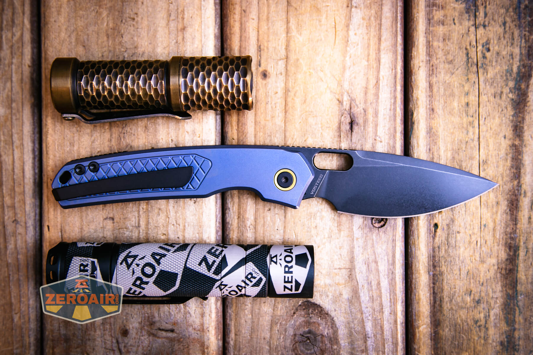 Vosteed Psyop Elmax blade knife compared to two standard flashlights