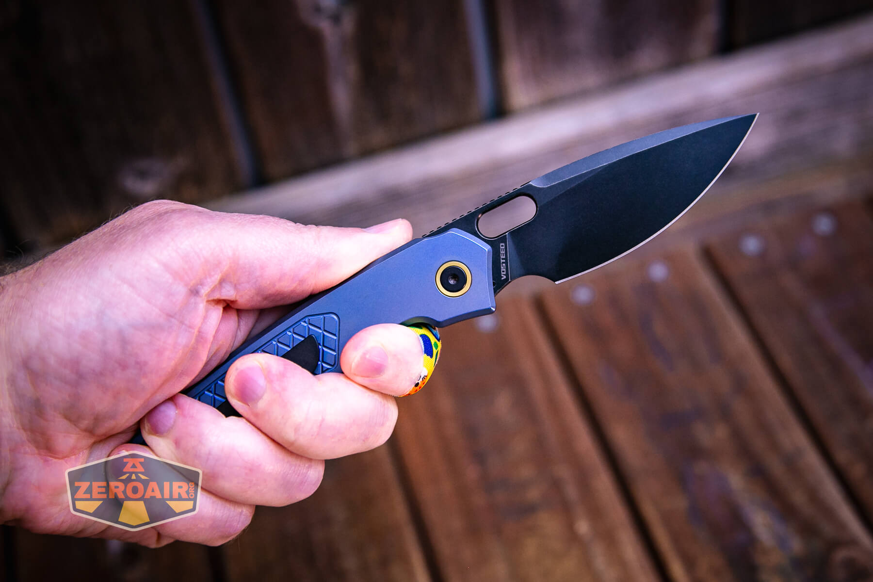 Vosteed Psyop Elmax blade knife open in hand