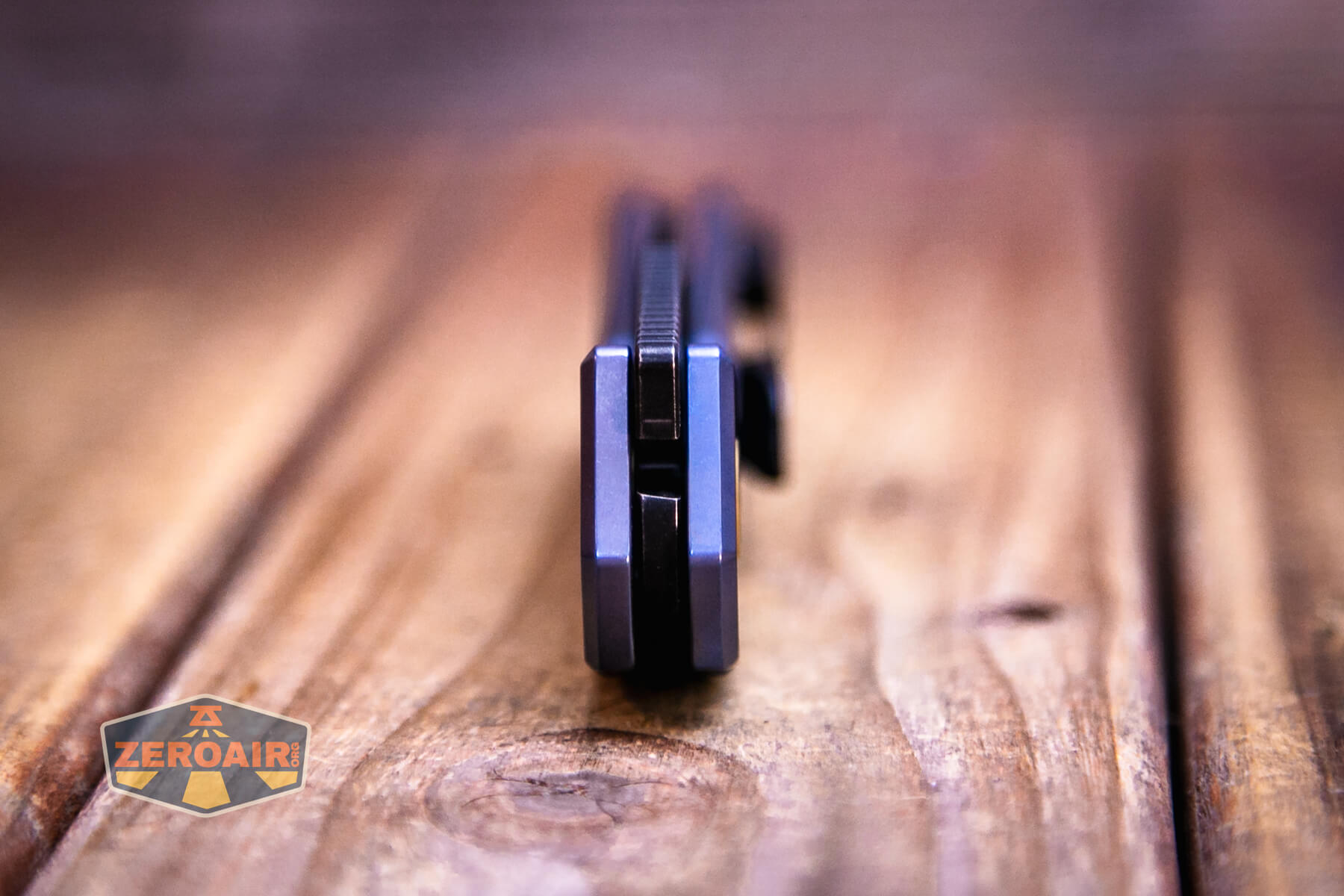 Vosteed Psyop Elmax blade knife pivot end view