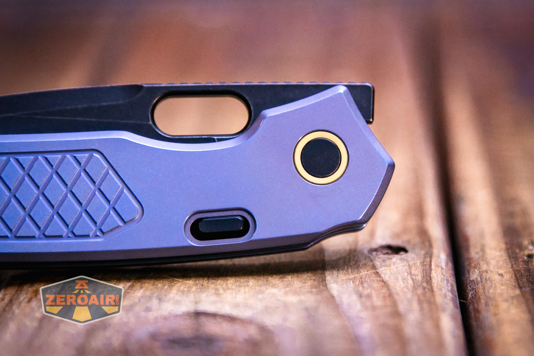 Vosteed Psyop Elmax blade knife pivot view