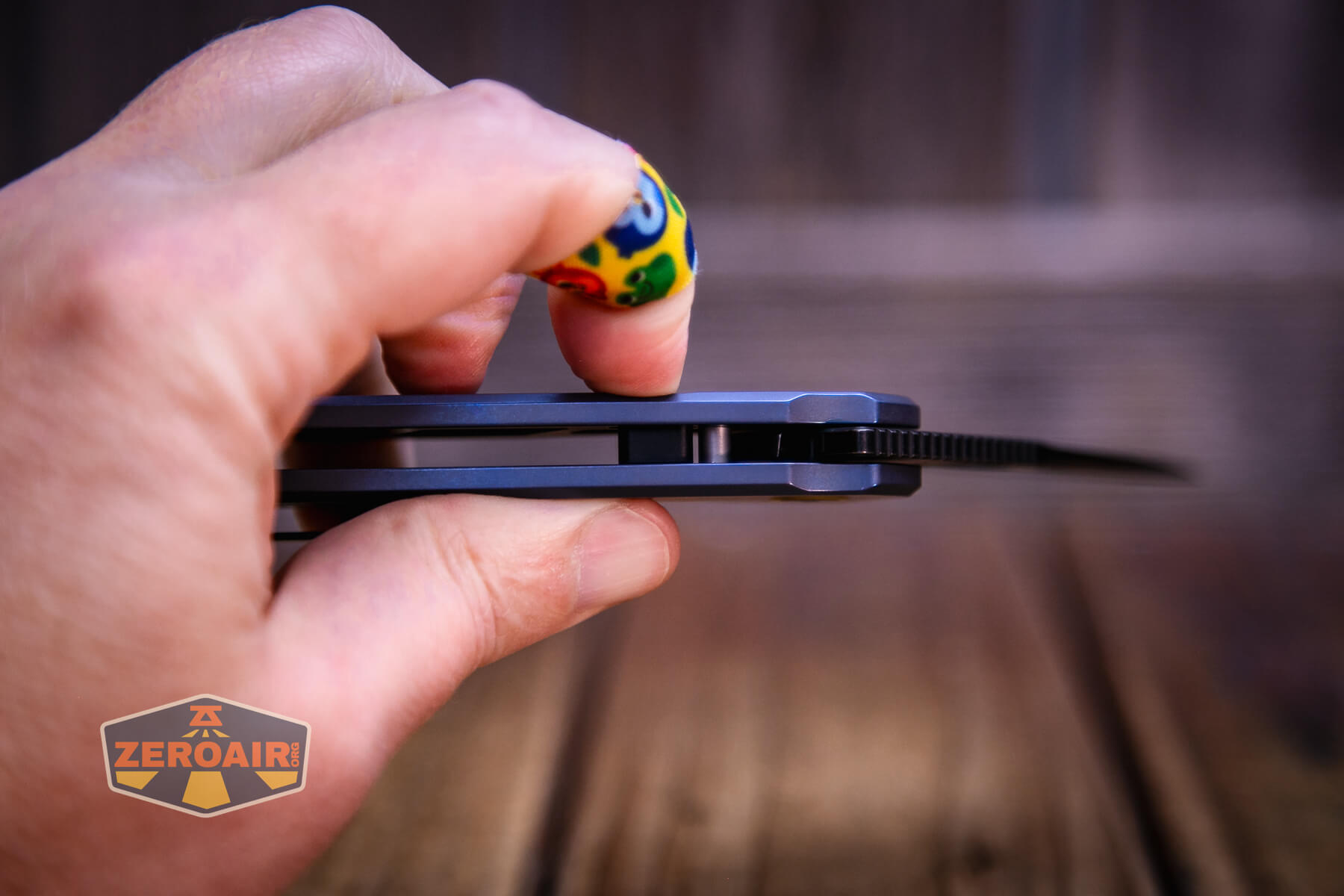 Vosteed Psyop Elmax blade knife lock disengaged, blade swinging