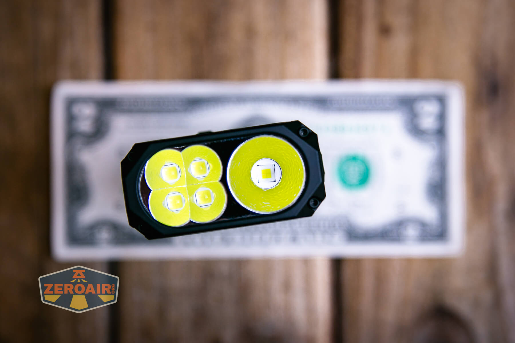 Wuben X1Pro Flashlight on two dollar bill