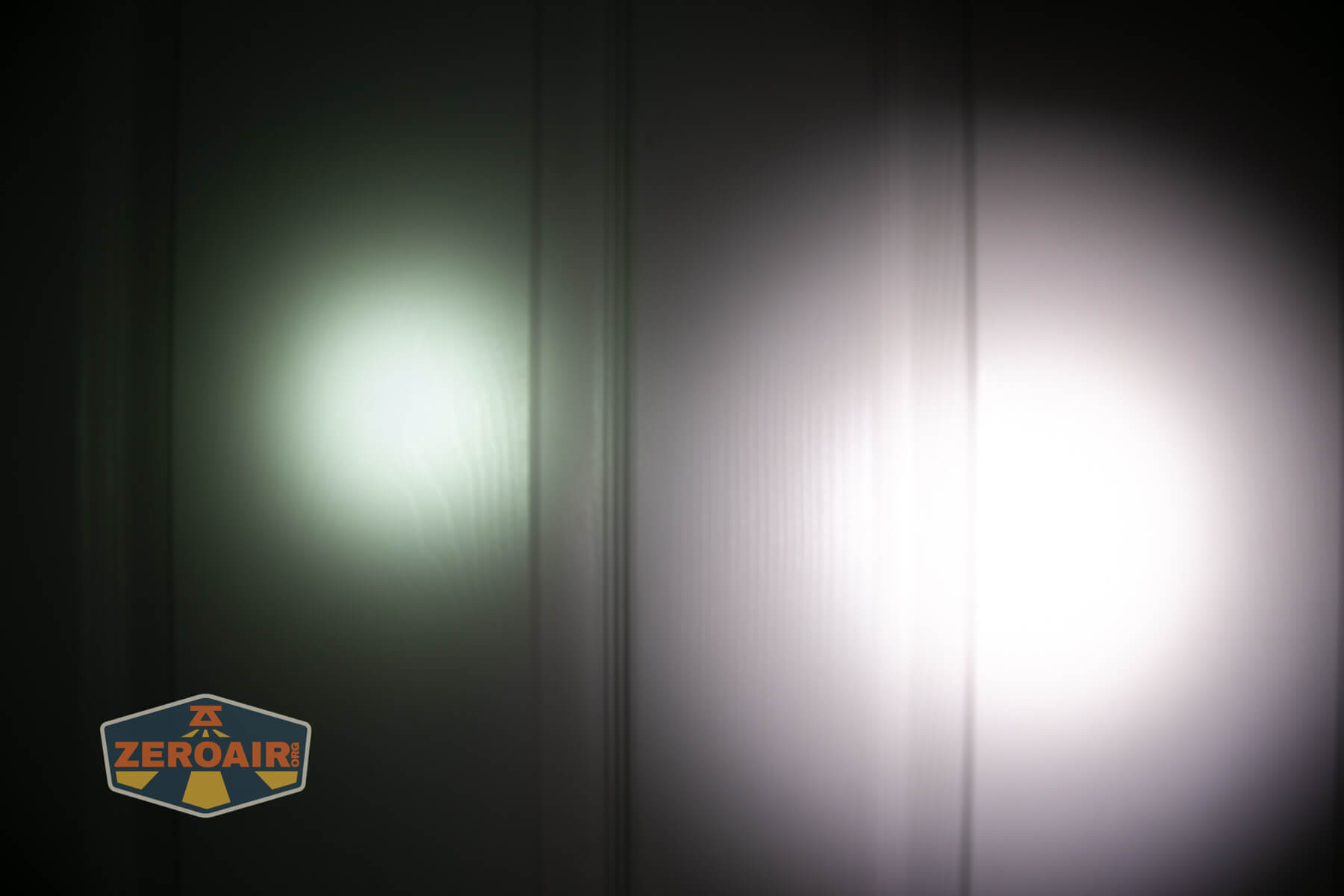 Wuben X1Pro Flashlight beamshots on door compared to Nichia 219b