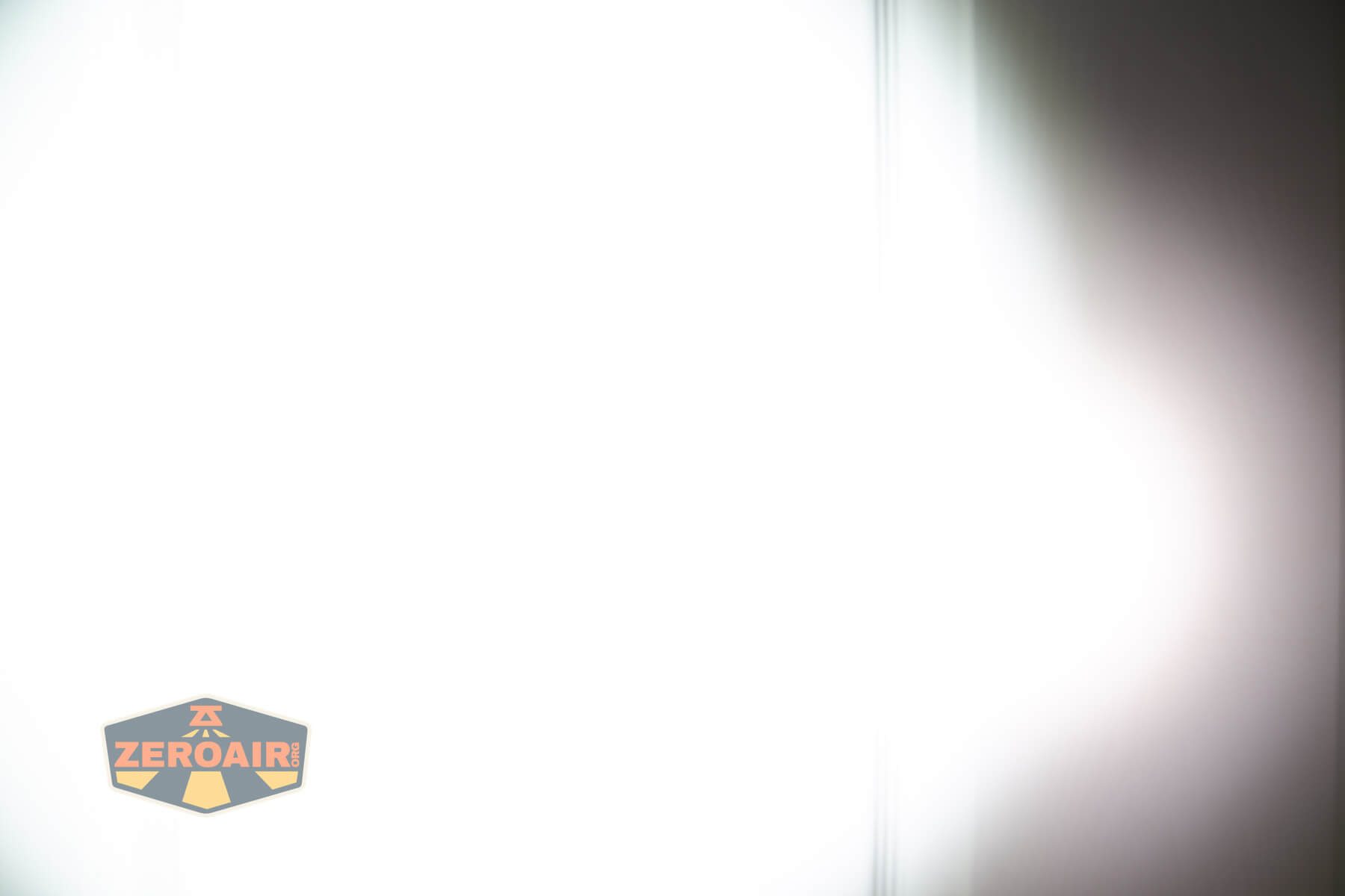 Wuben X1Pro Flashlight beamshots on door compared to Nichia 219b