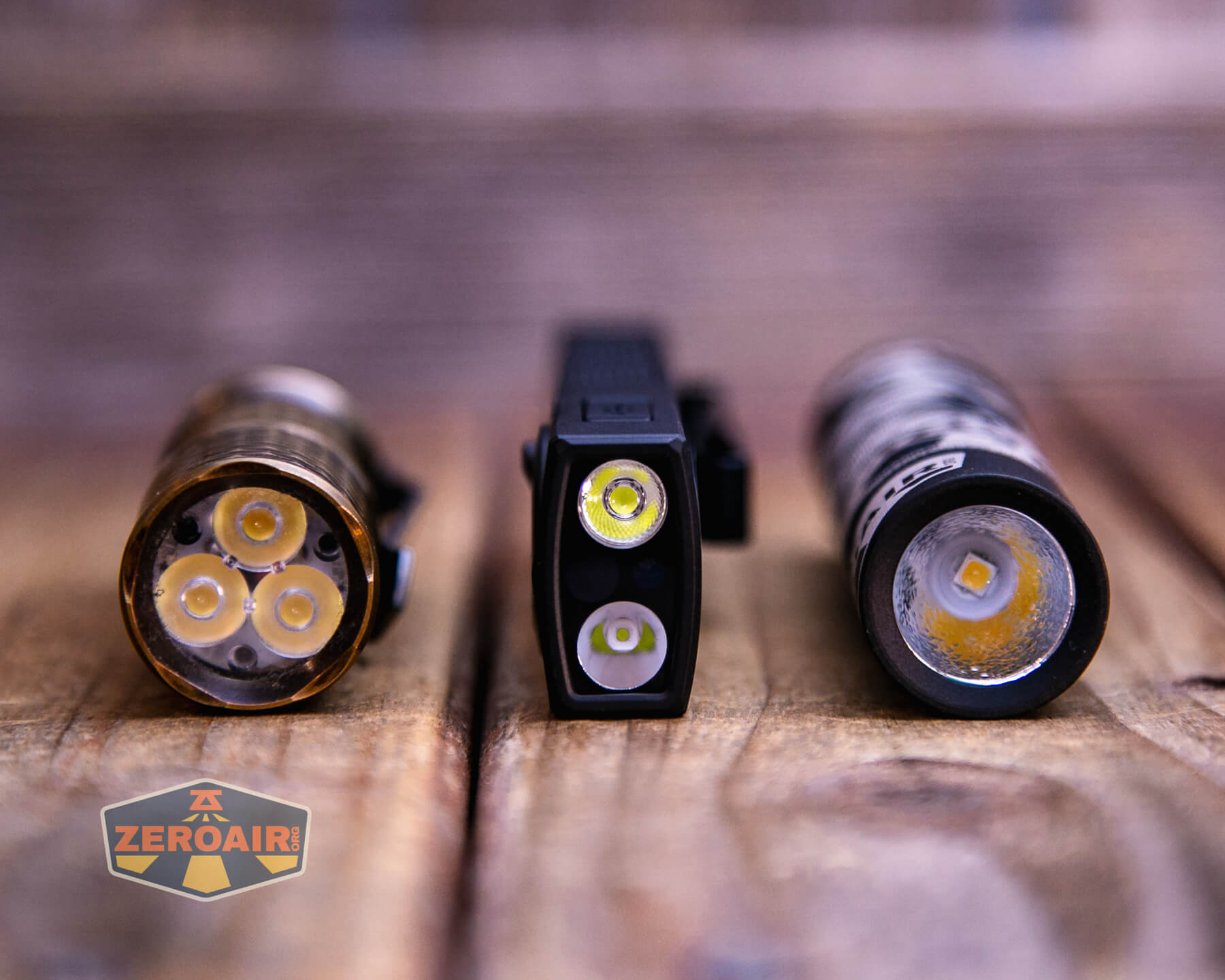 Olight ArkPro Matte Black cool white with standard-sized flashlights