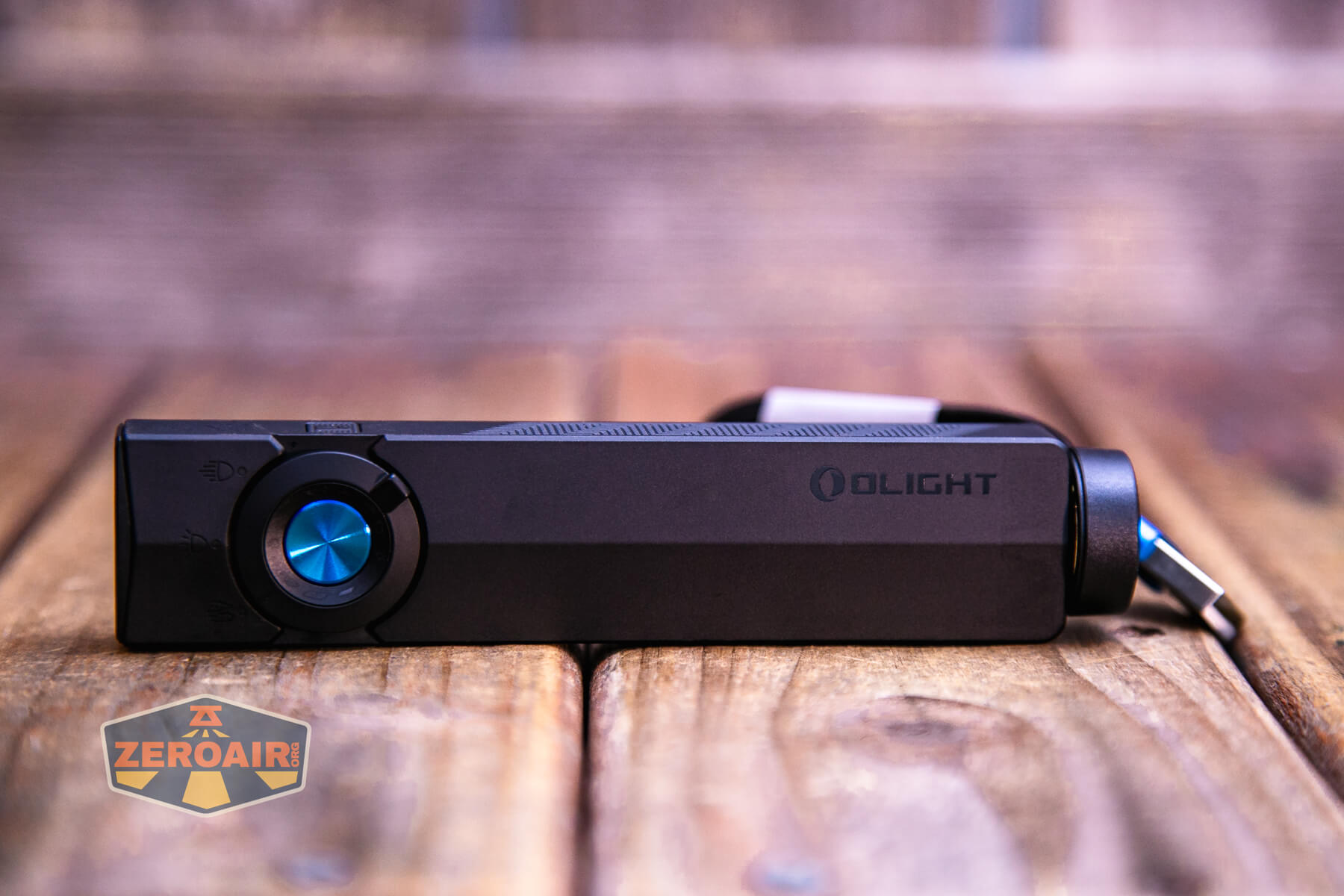 Olight ArkPro Matte Black cool white MCC charging base attached