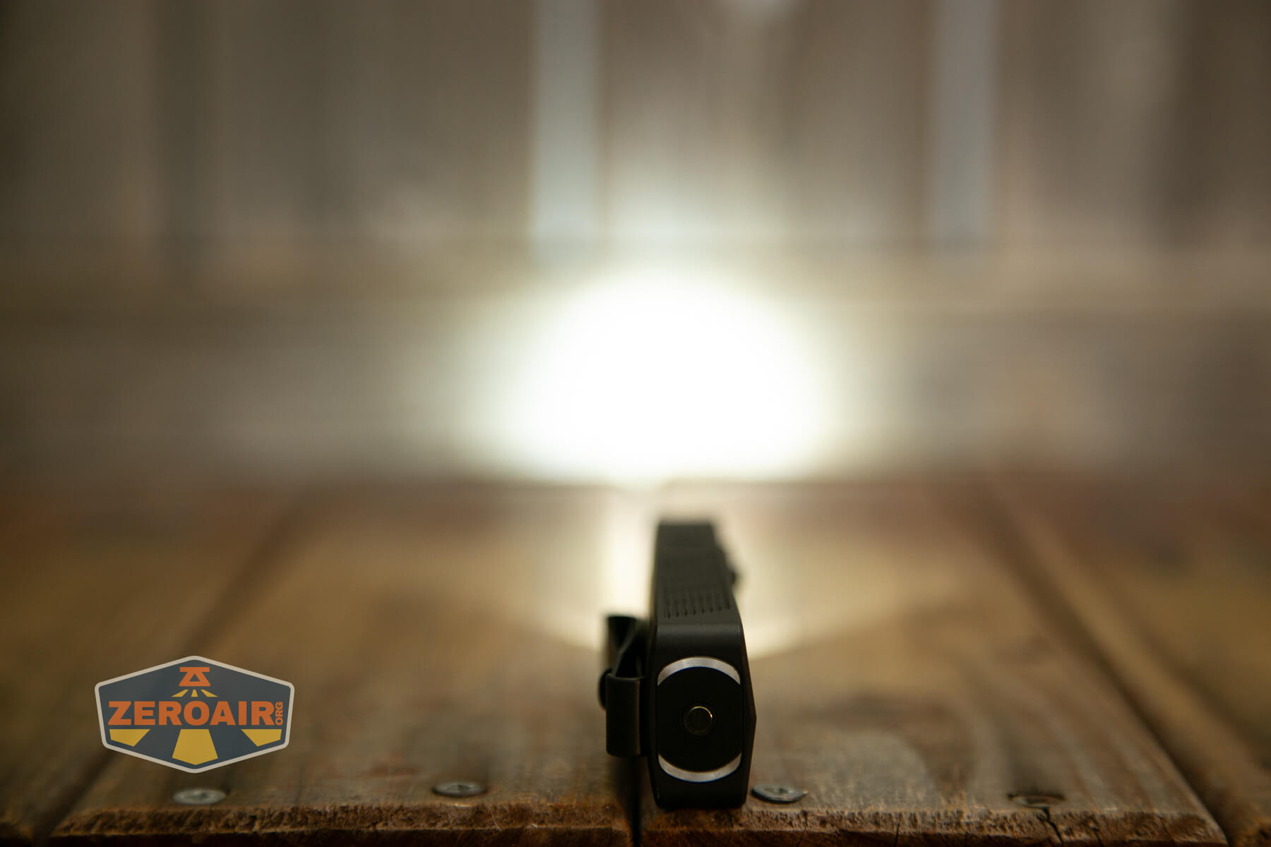 Olight ArkPro Matte Black cool white spot emitter on