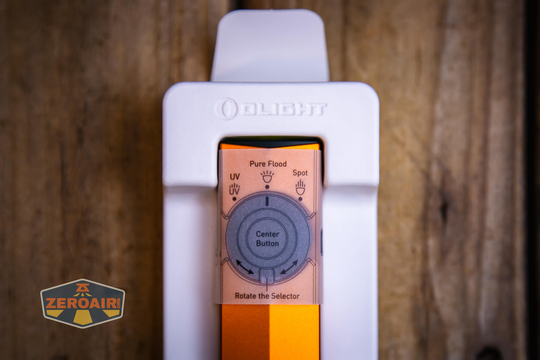 Olight ArkPro Orange flashlight inside box