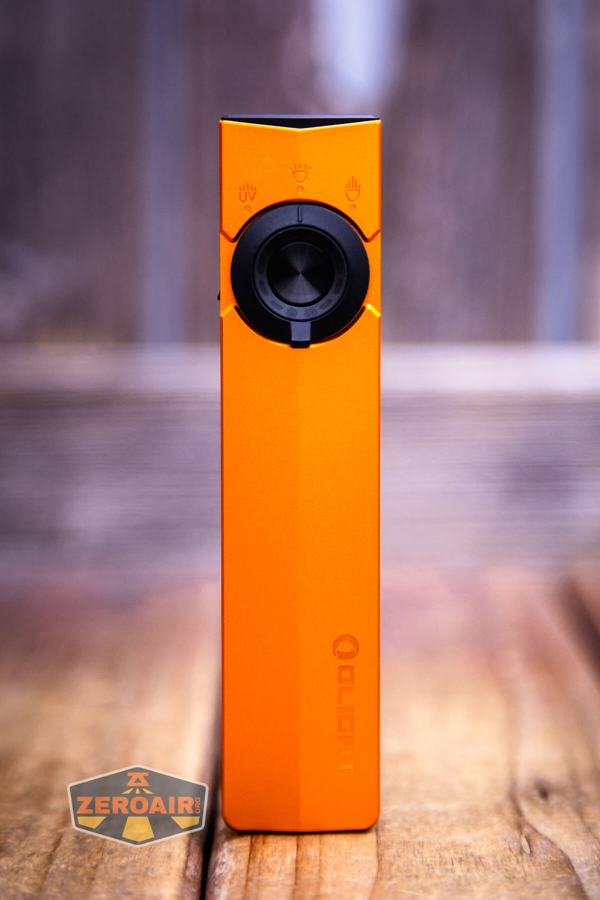 Olight ArkPro Orange flashlight showing all sides