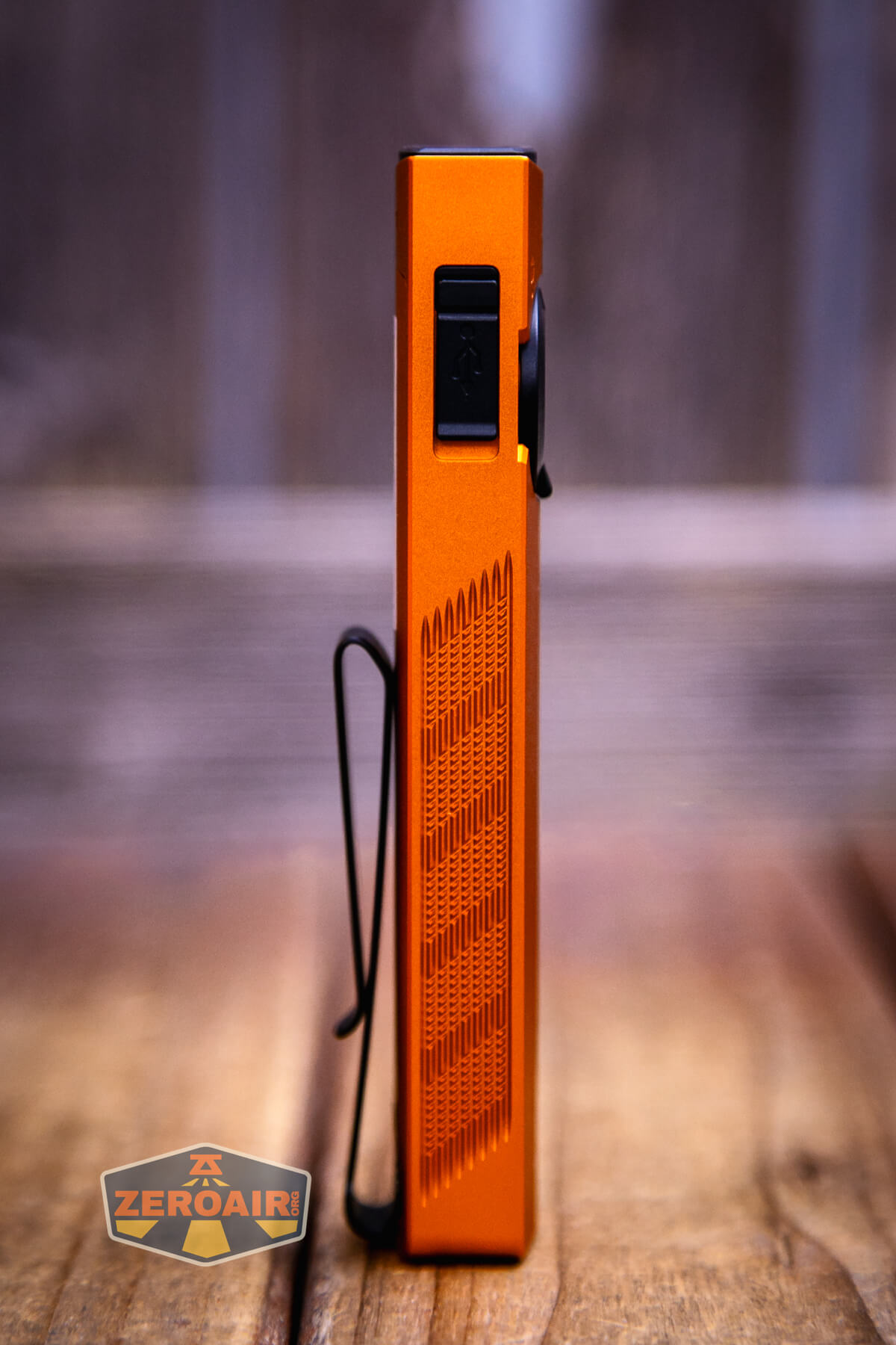 Olight ArkPro Orange flashlight showing all sides